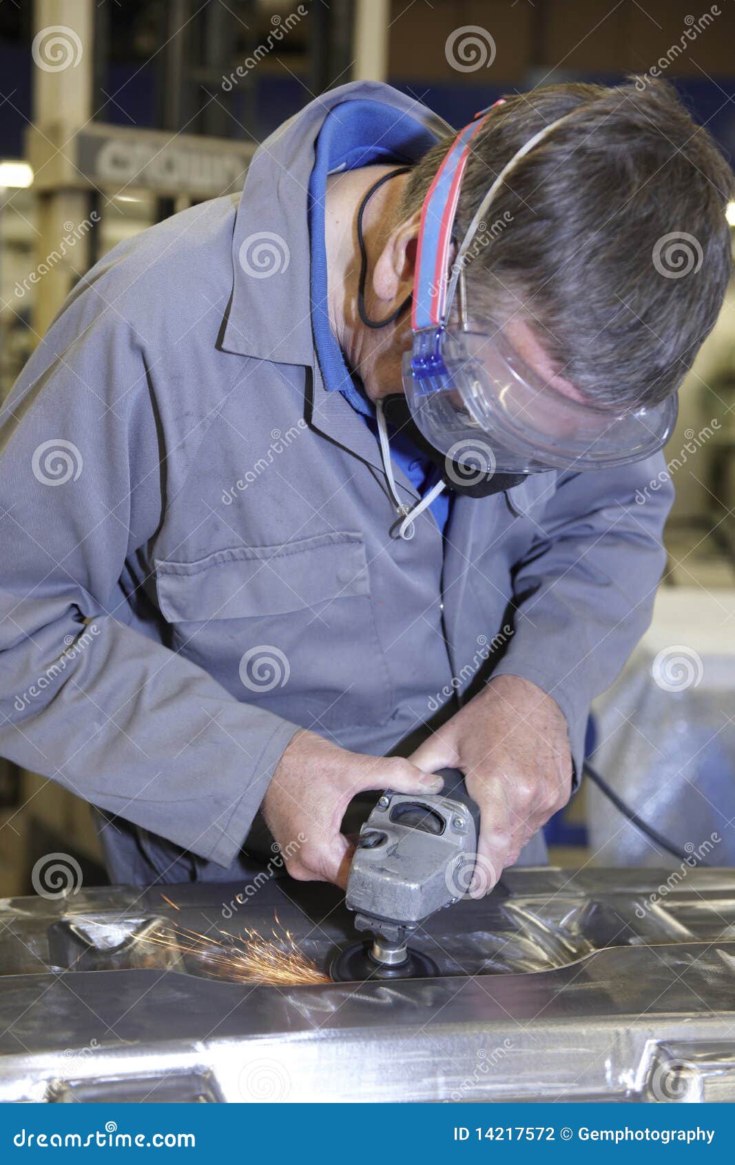 Worker with angle grinder stock photo. Image of working 14217572