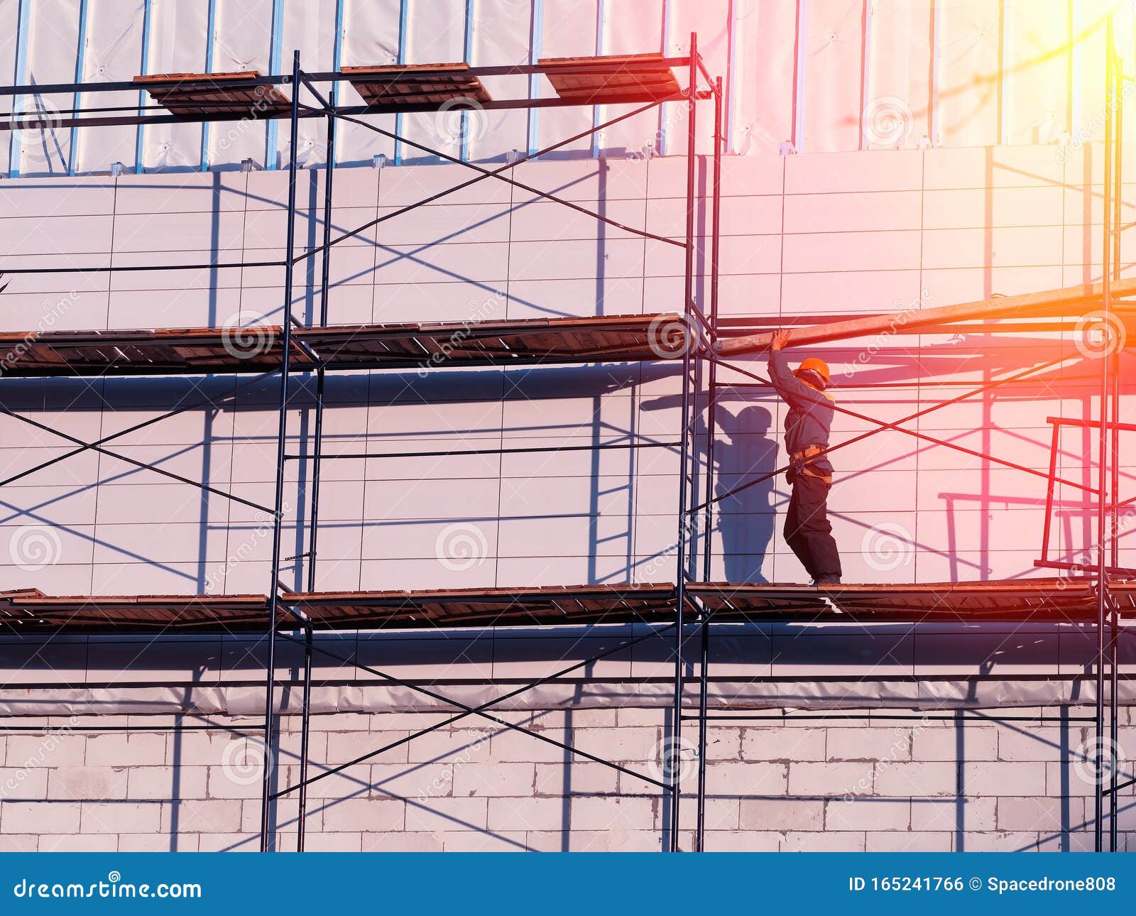 Worker Building Scaffolding Construction Background Stock Photo - Image