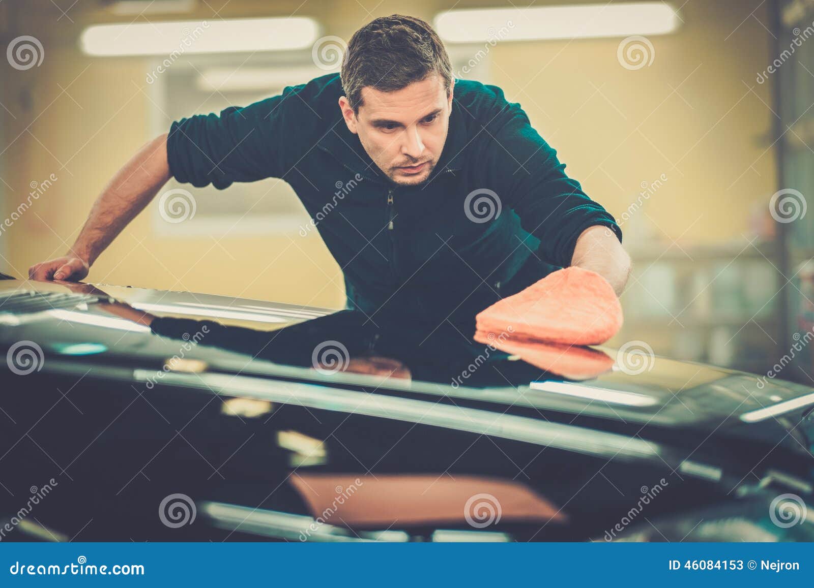 Worker on a car wash stock image. Image of service, restore 46084153