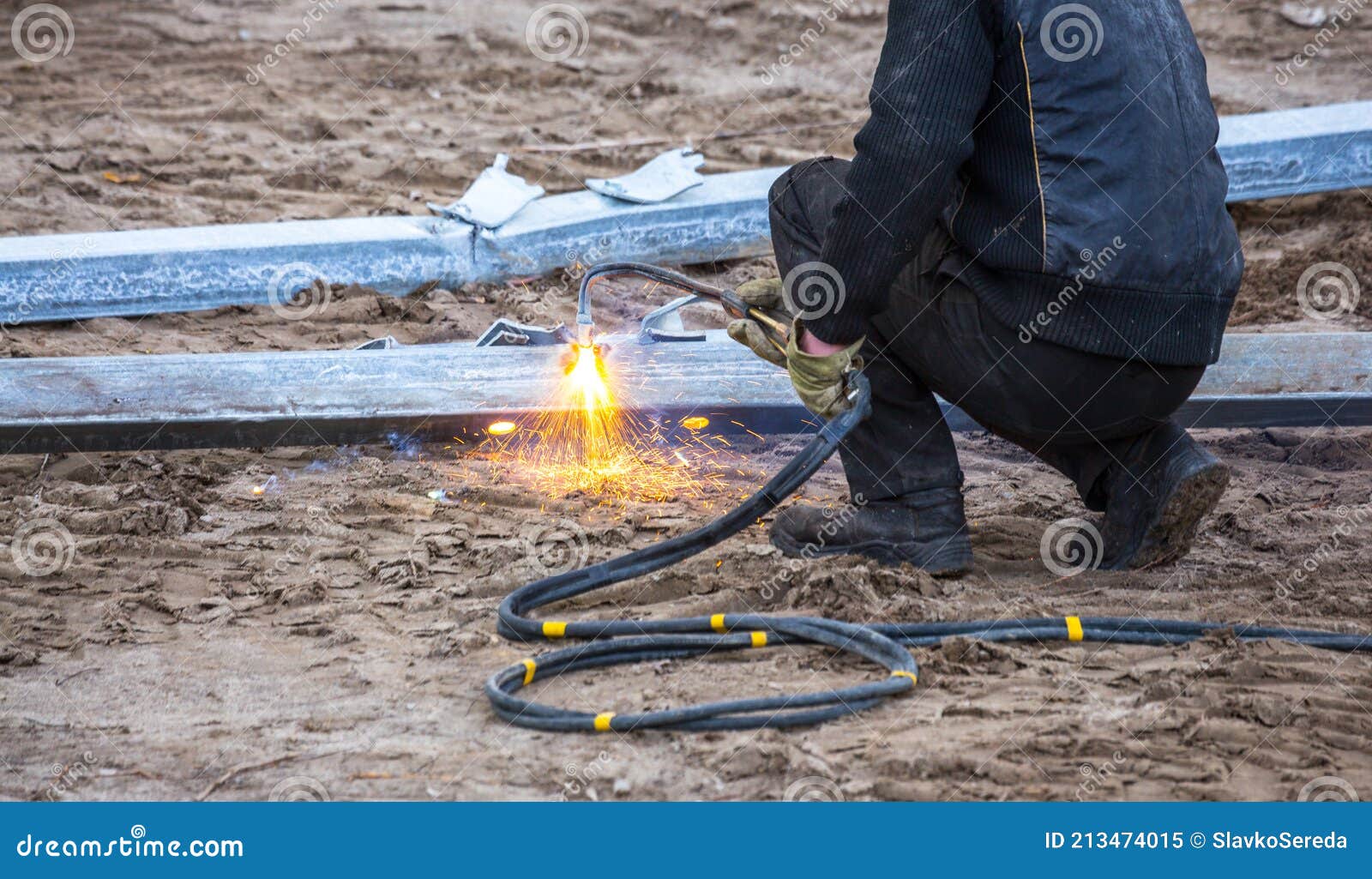 A Worker Cut Steel Beams Using Propane-oxygen Torch. Stock Image