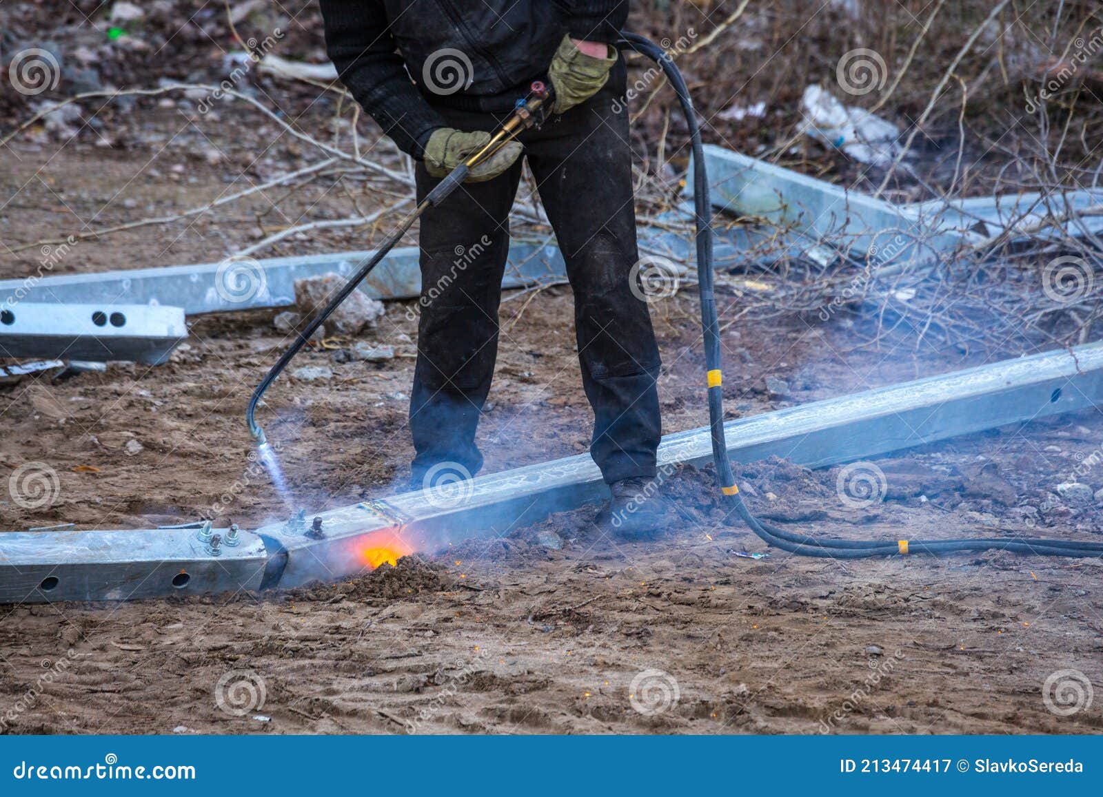 A Worker Cut Steel Beams Using Propane-oxygen Torch. Stock Image