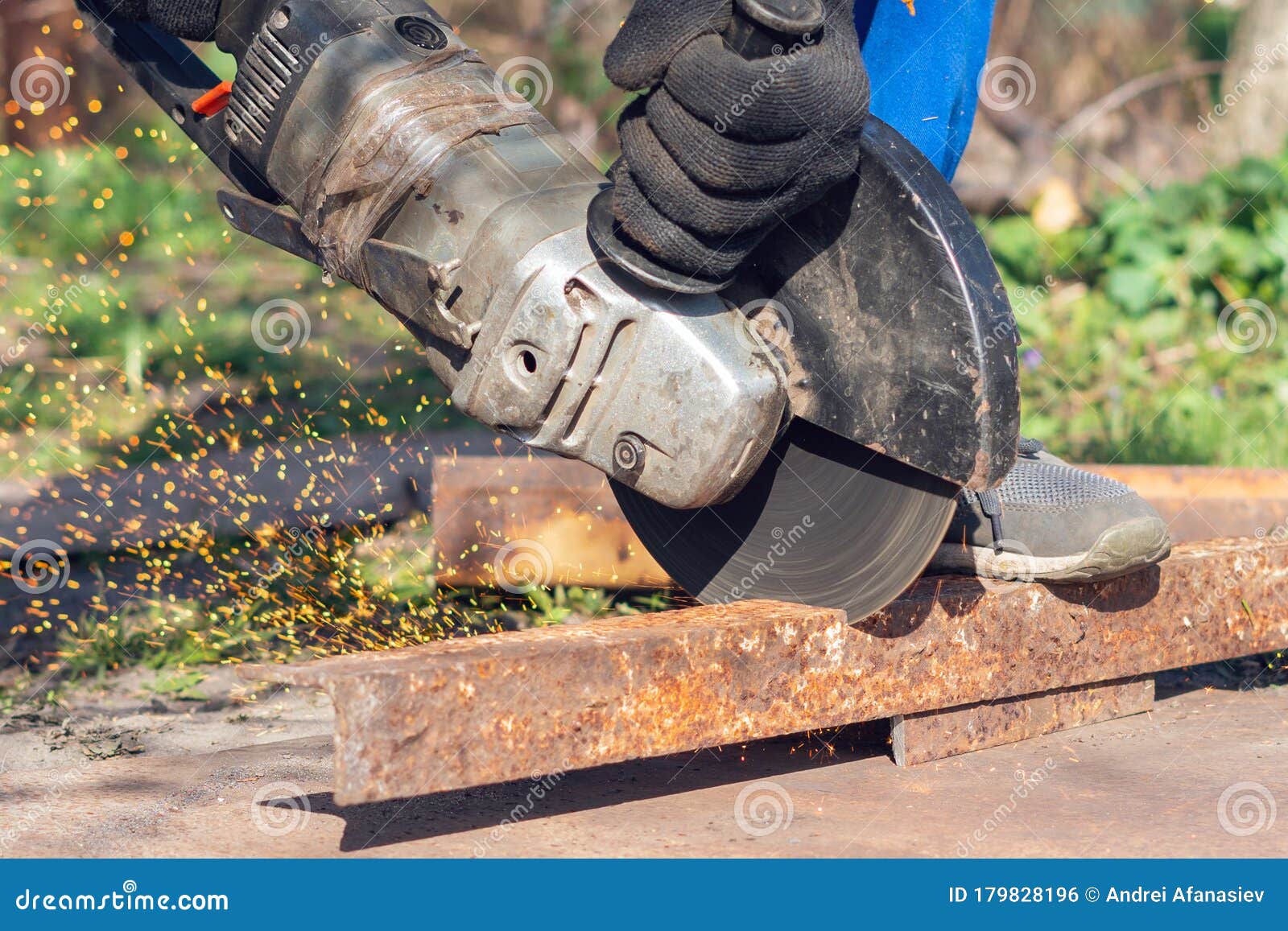 Worker Cuts Metal with an Angle Grinder Stock Photo Image of circular