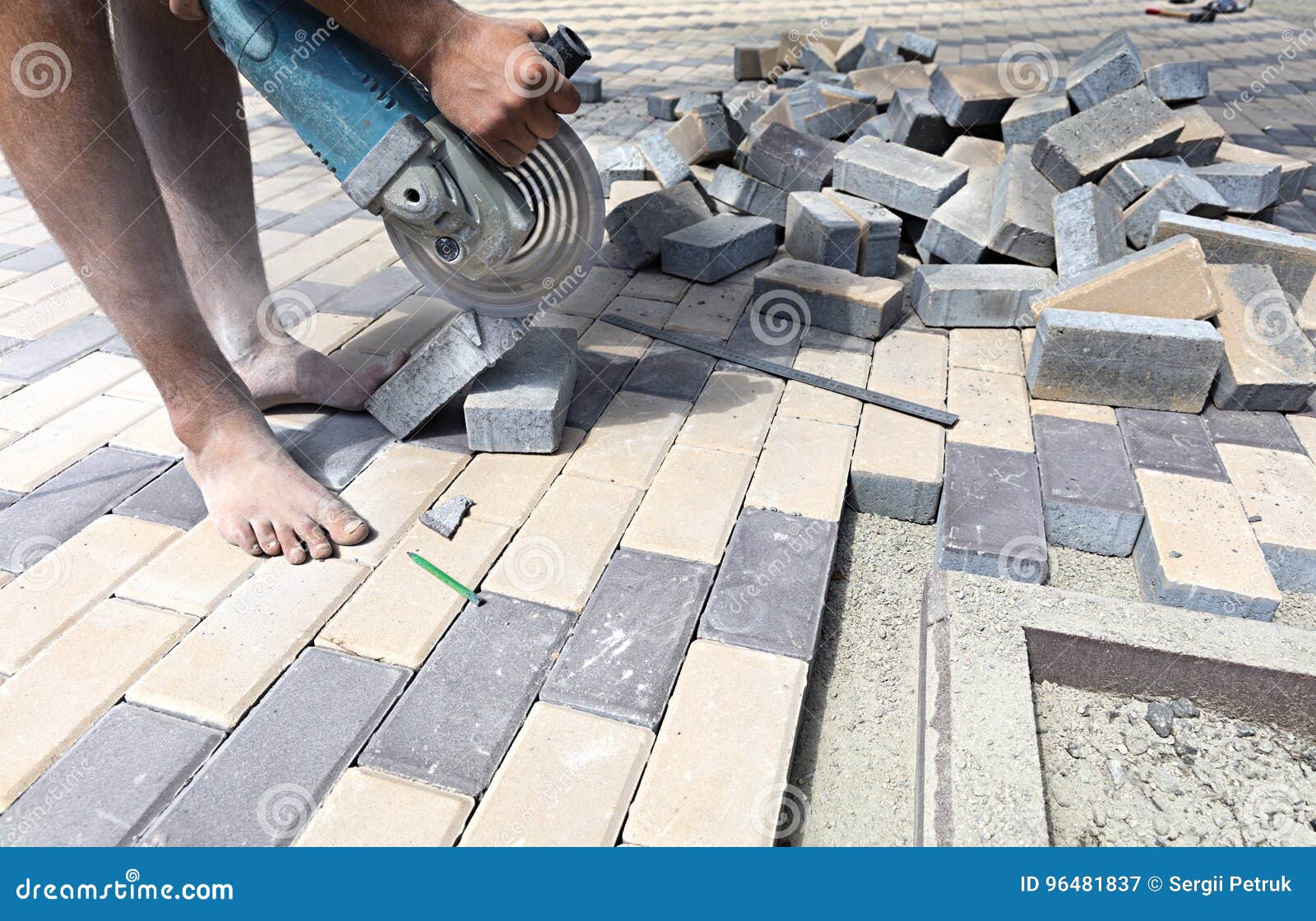 Worker Cuts Paving Slabs for Laying on the Terrace Stock Image Image