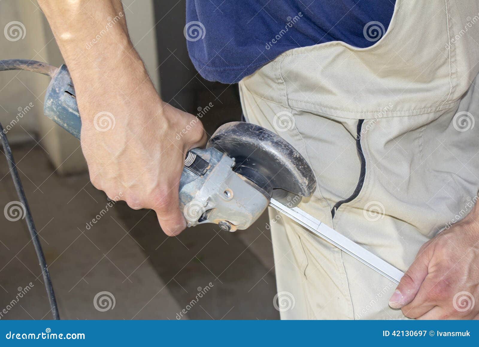 Worker cutting aluminum stock image. Image of laborer 42130697
