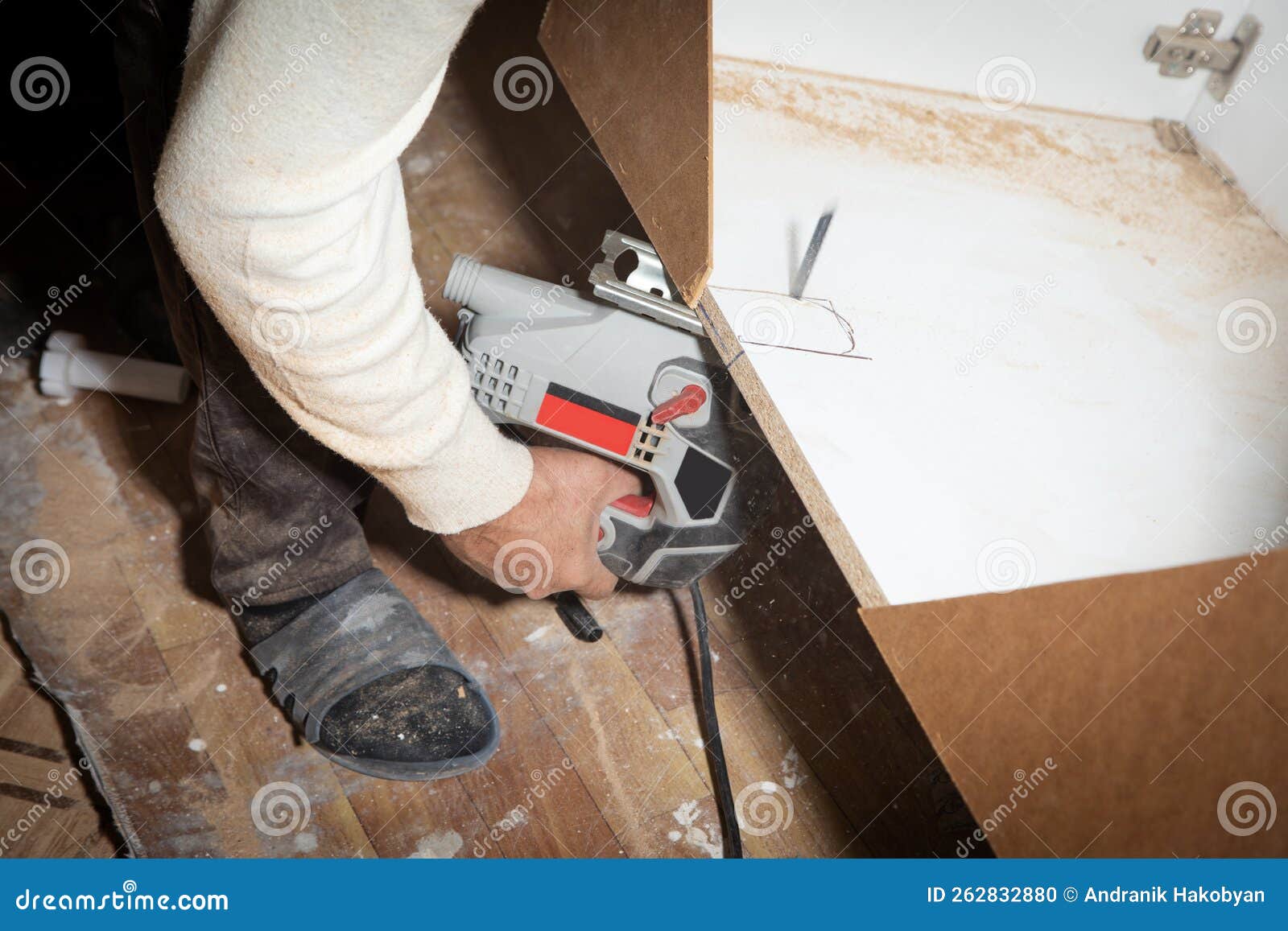 Worker Cutting Kitchen Using Electric Saw Stock Photo Image