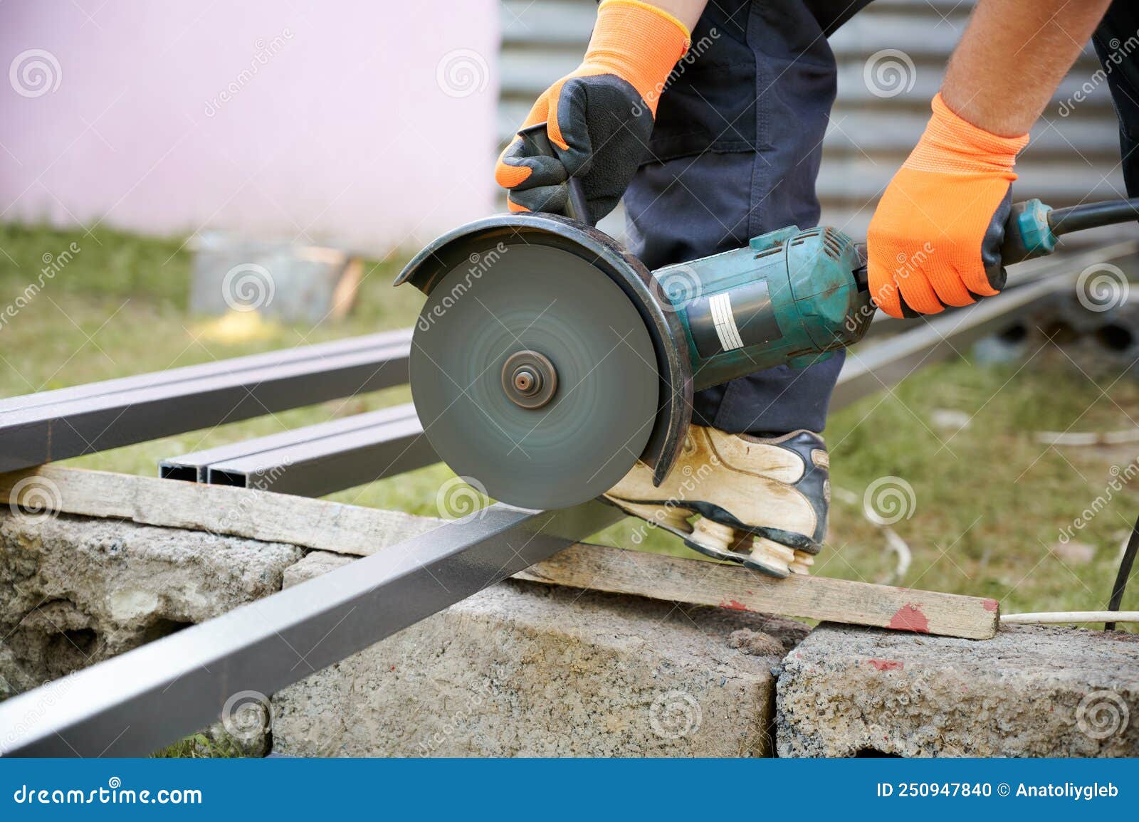 Worker Cutting Metal Pole in Construction Zone Stock Photo Image of