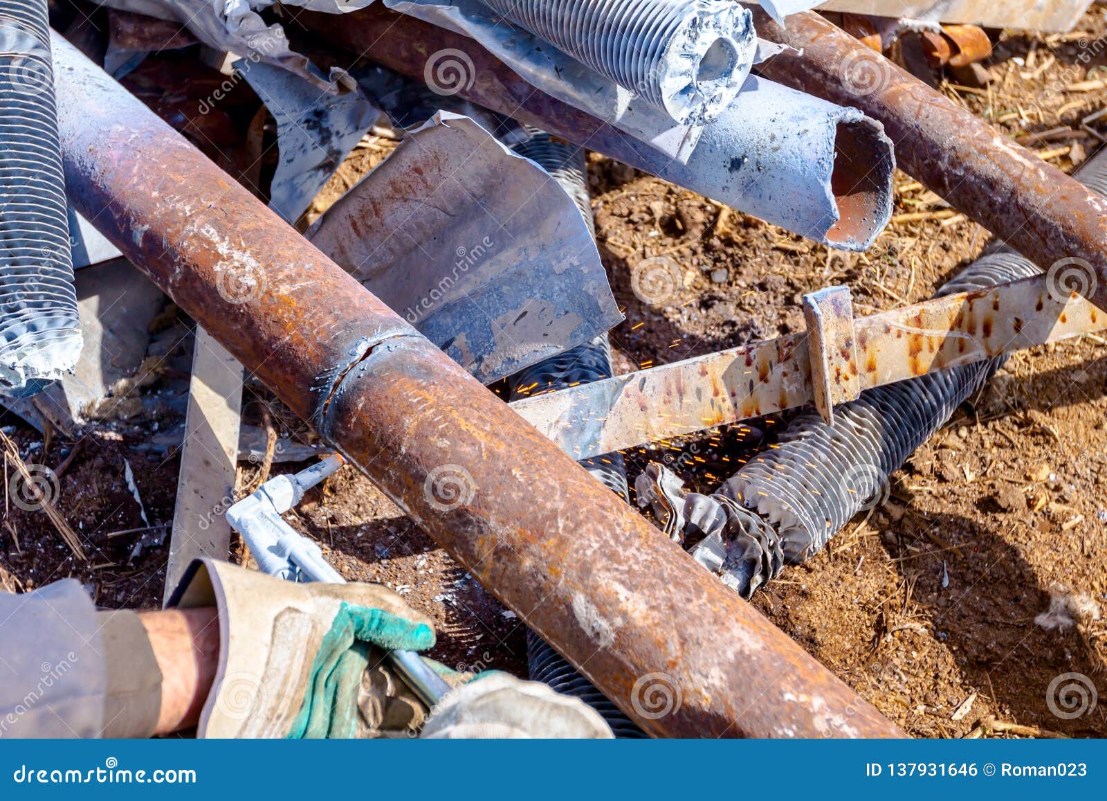 Worker is Cutting Scrap Metal with Acetylene Torch Stock Photo - Image