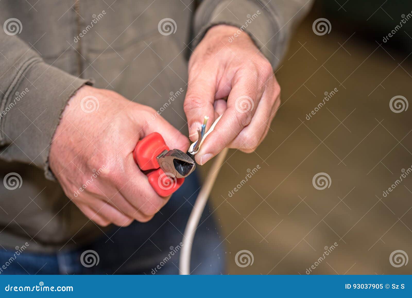 Worker Cutting Wire with Pliers Stock Image Image of installing