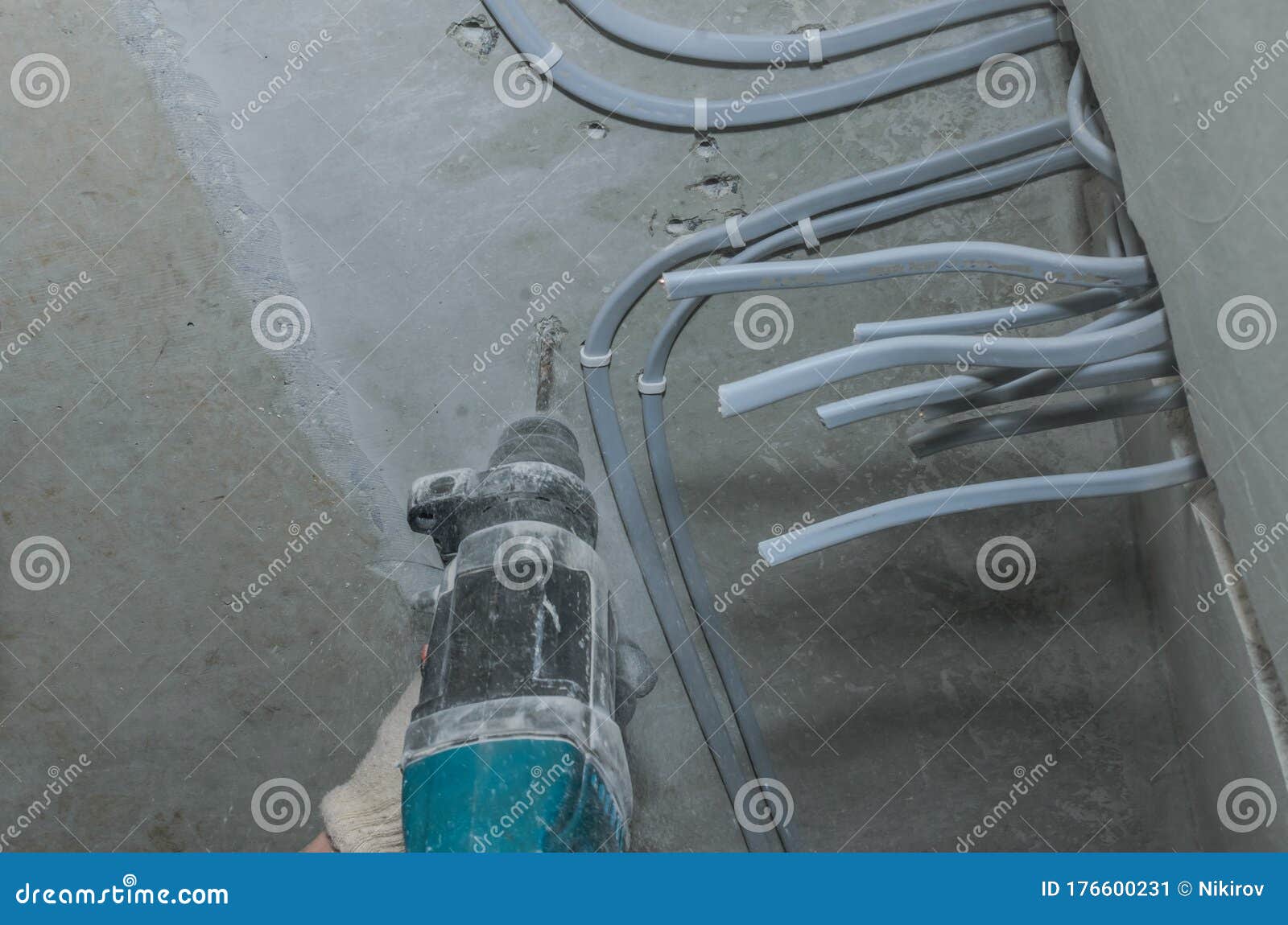 Worker Drills a Concrete Wall with a Hammer Drill Stock Image Image of drills, jackhammer