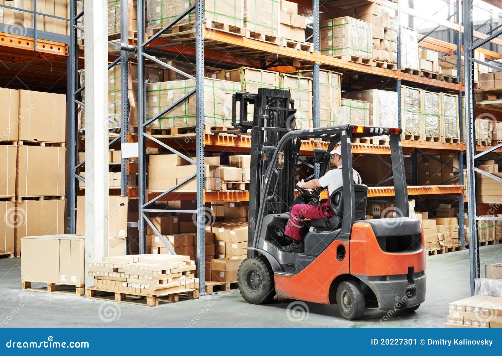 worker driver at warehouse forklift