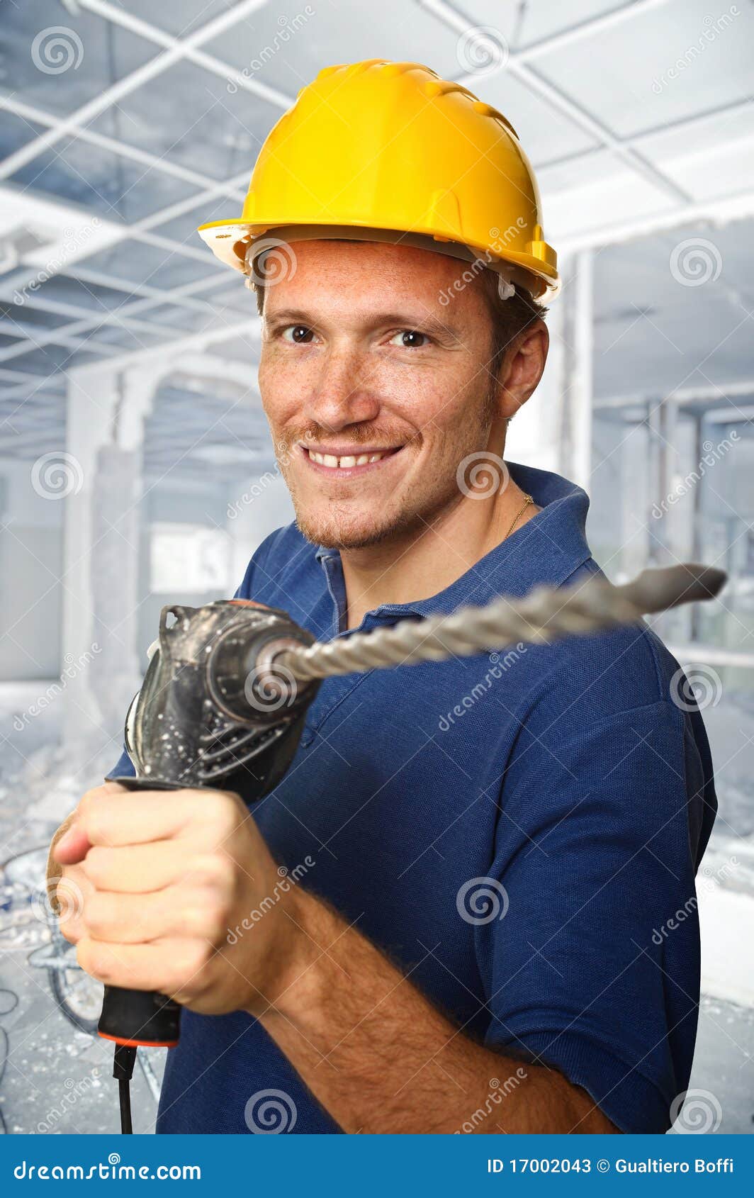 Worker with electric drill stock image. Image of drill 17002043