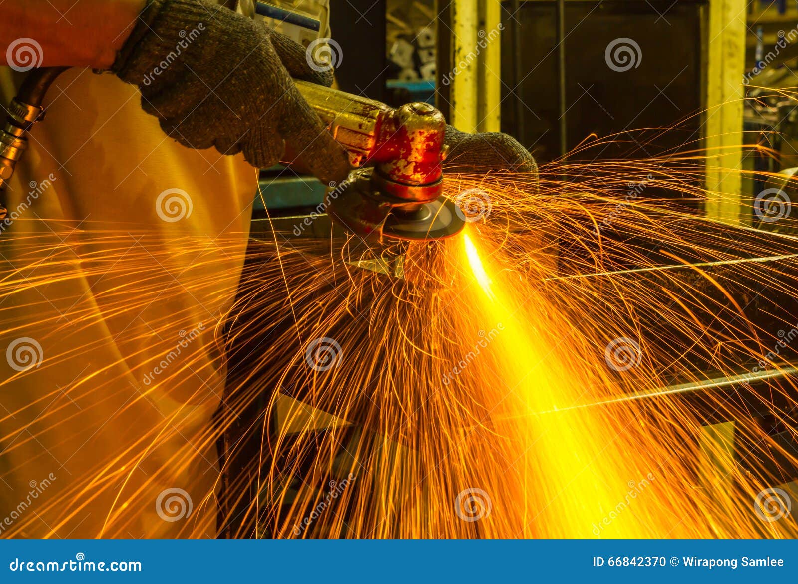 The worker grinding metal stock photo. Image of light 66842370