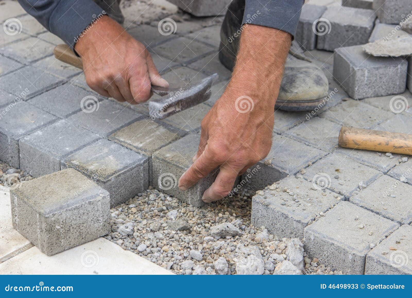Worker Hands Laying Concrete Brick Pavers Stock Image Image of hammer