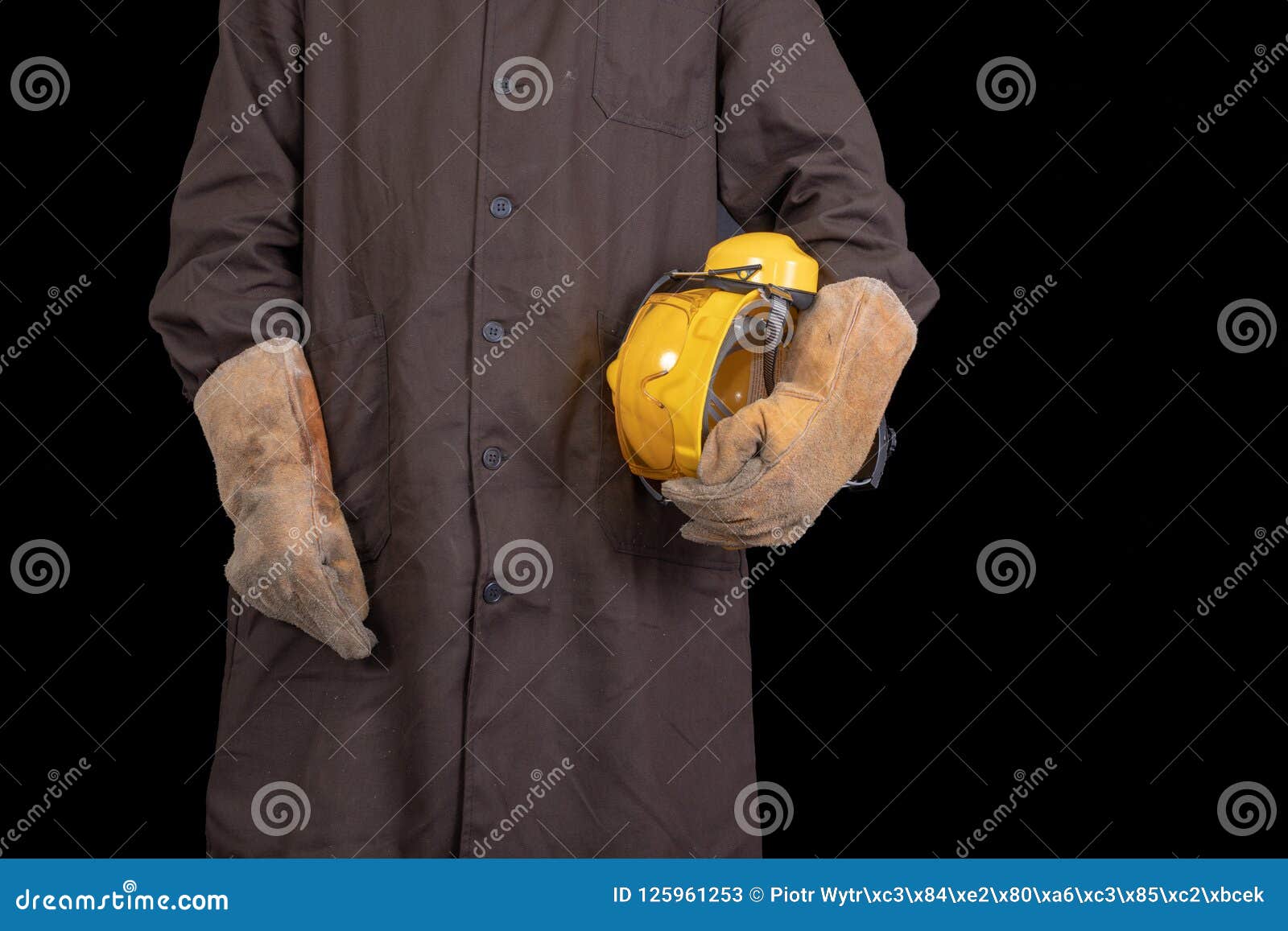 Worker with a Helmet in His Hand Wearing a Protective Apron. Health ...