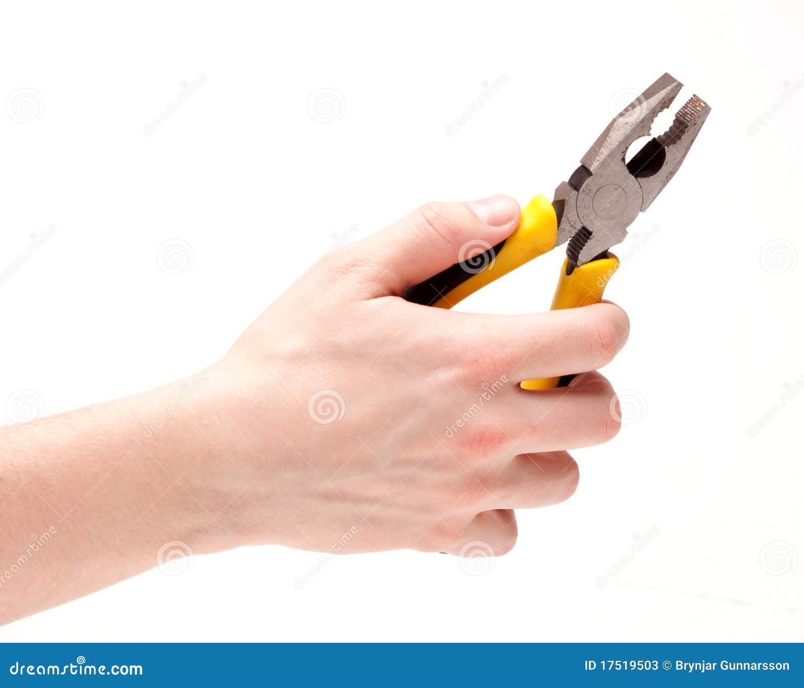 A worker holding Pliers stock image. Image of object 17519503