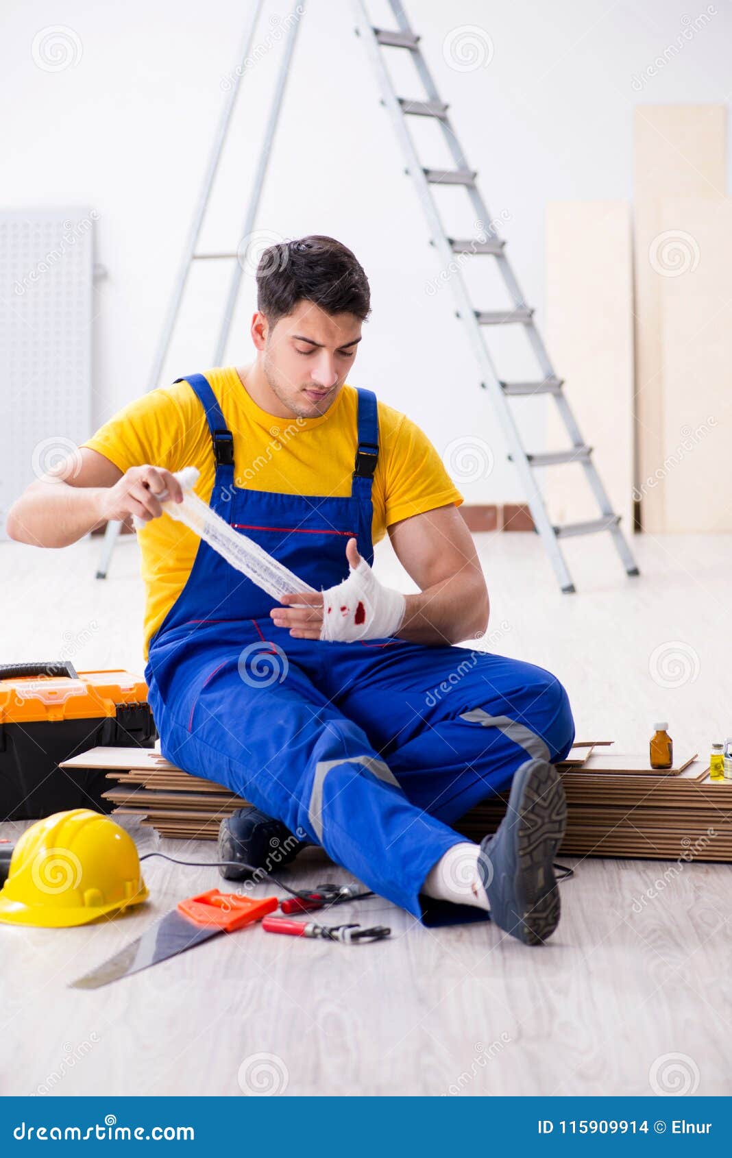 The Worker with Injured Hand at Construction Site Stock Photo Image of paramedic, bandage