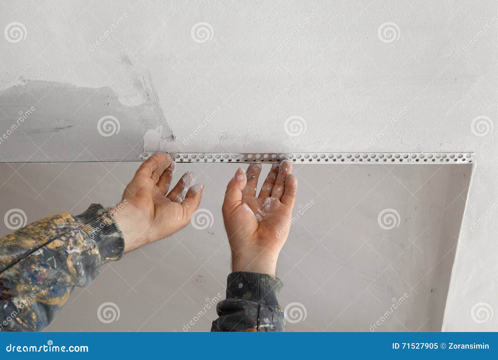 Worker Install Batten At Ceiling And Wall Stock Image Image Of