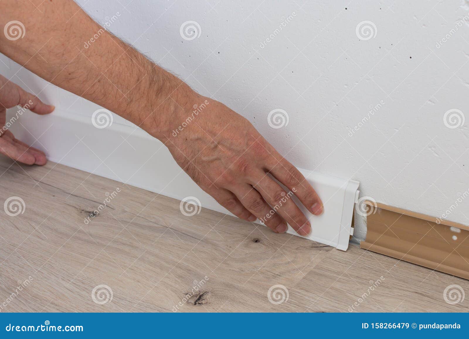 Worker Installing Plastic Skirting Board Stock Image Image Of