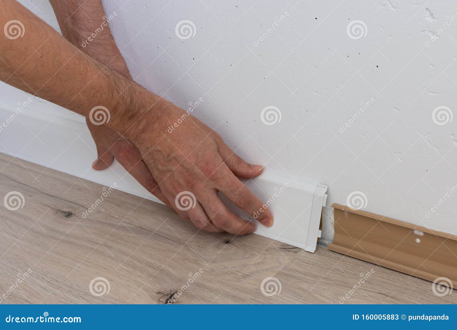 Worker Installing Plastic Skirting Board Stock Image Image Of