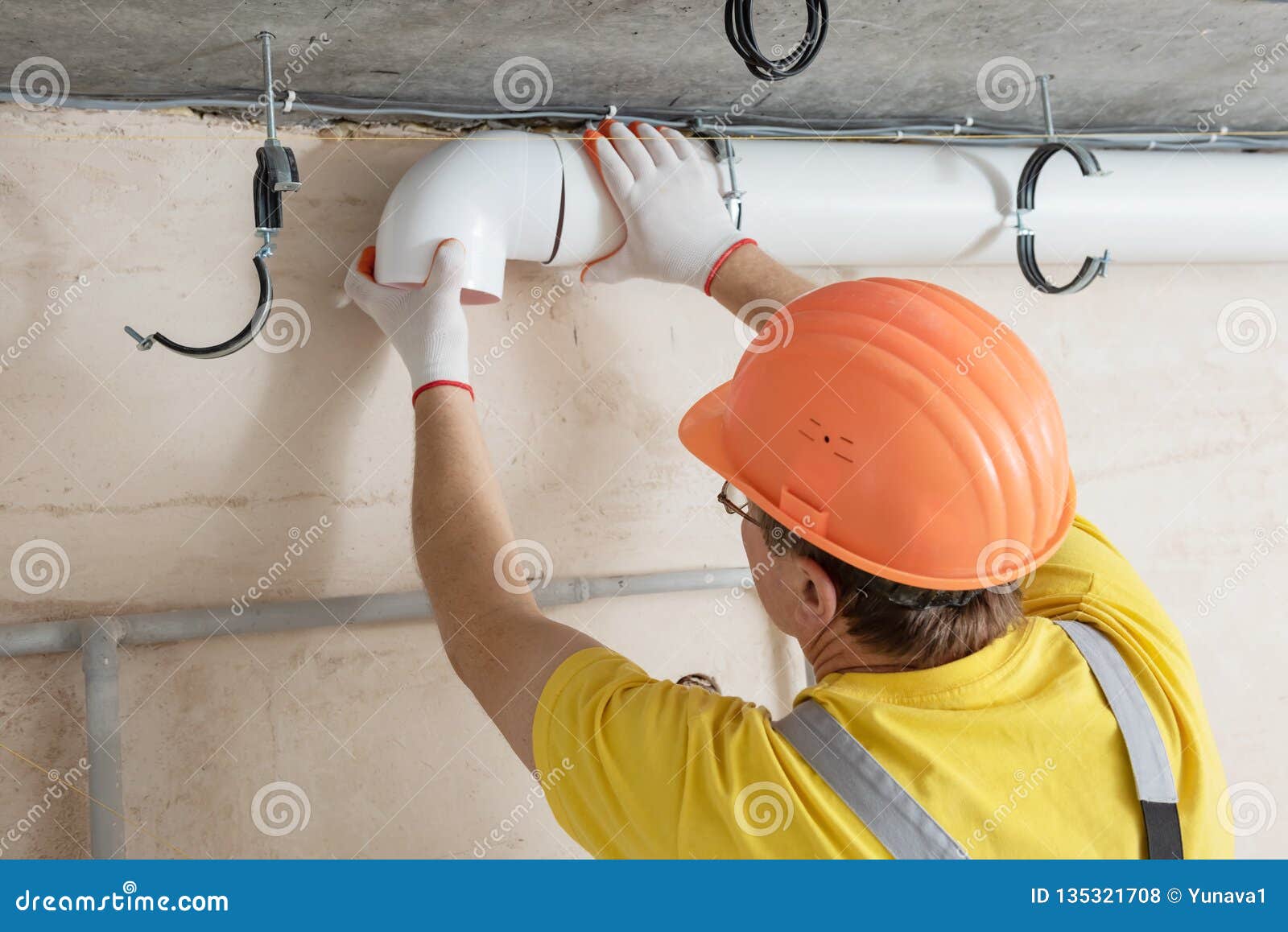 The Worker is Installing a Ventilation System Stock Photo Image of