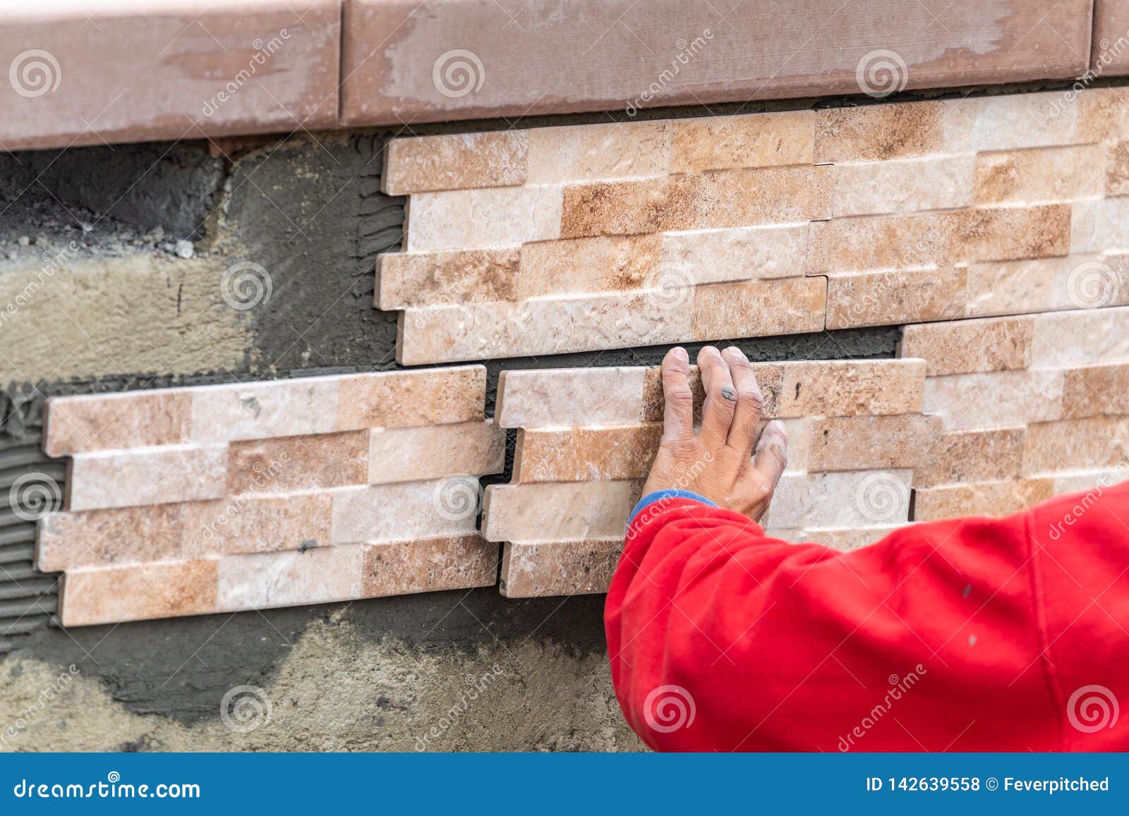 Worker Installing Wall Tile at Construction Site Stock Photo Image of