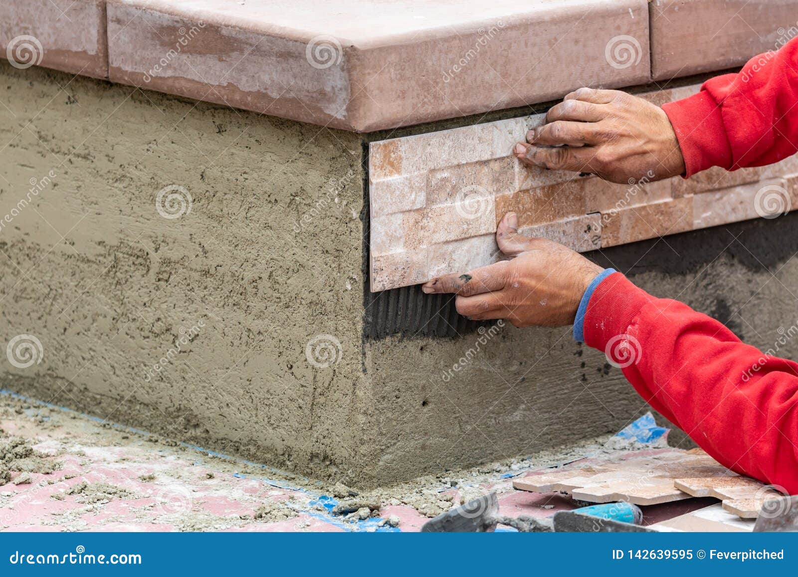 Worker Installing Wall Tile at Construction Site Stock Image Image of