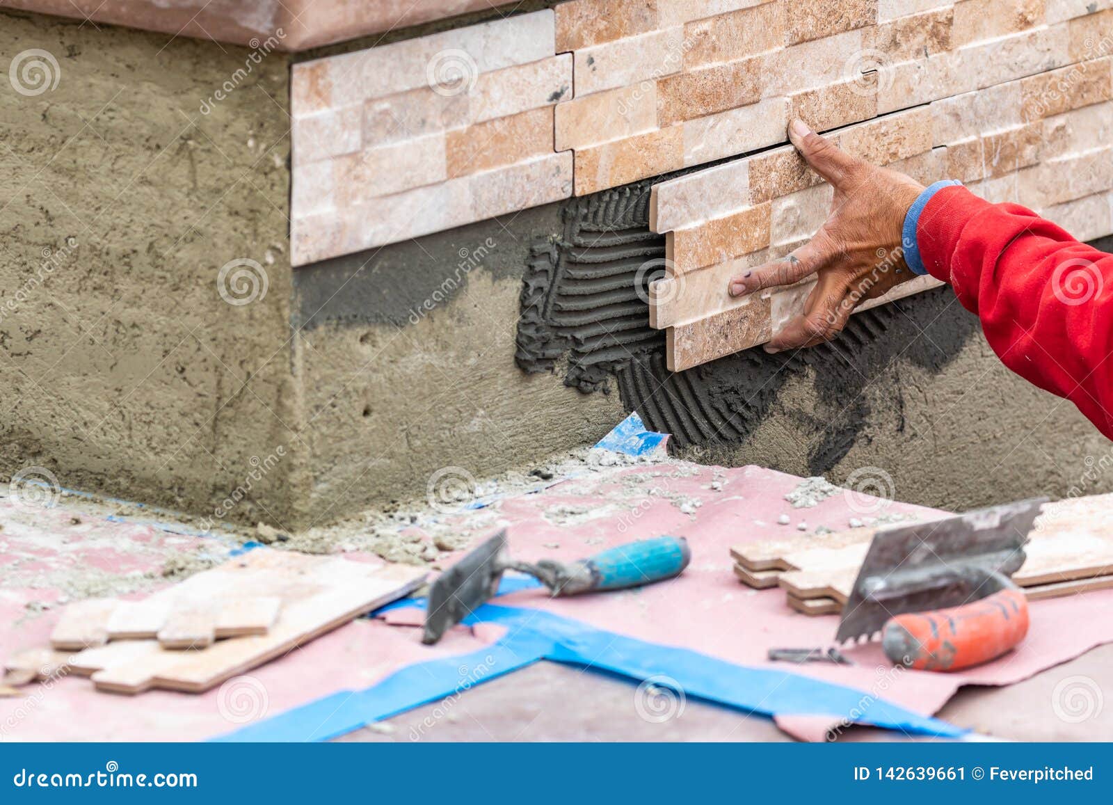 Worker Installing Wall Tile at Construction Site Stock Image Image of
