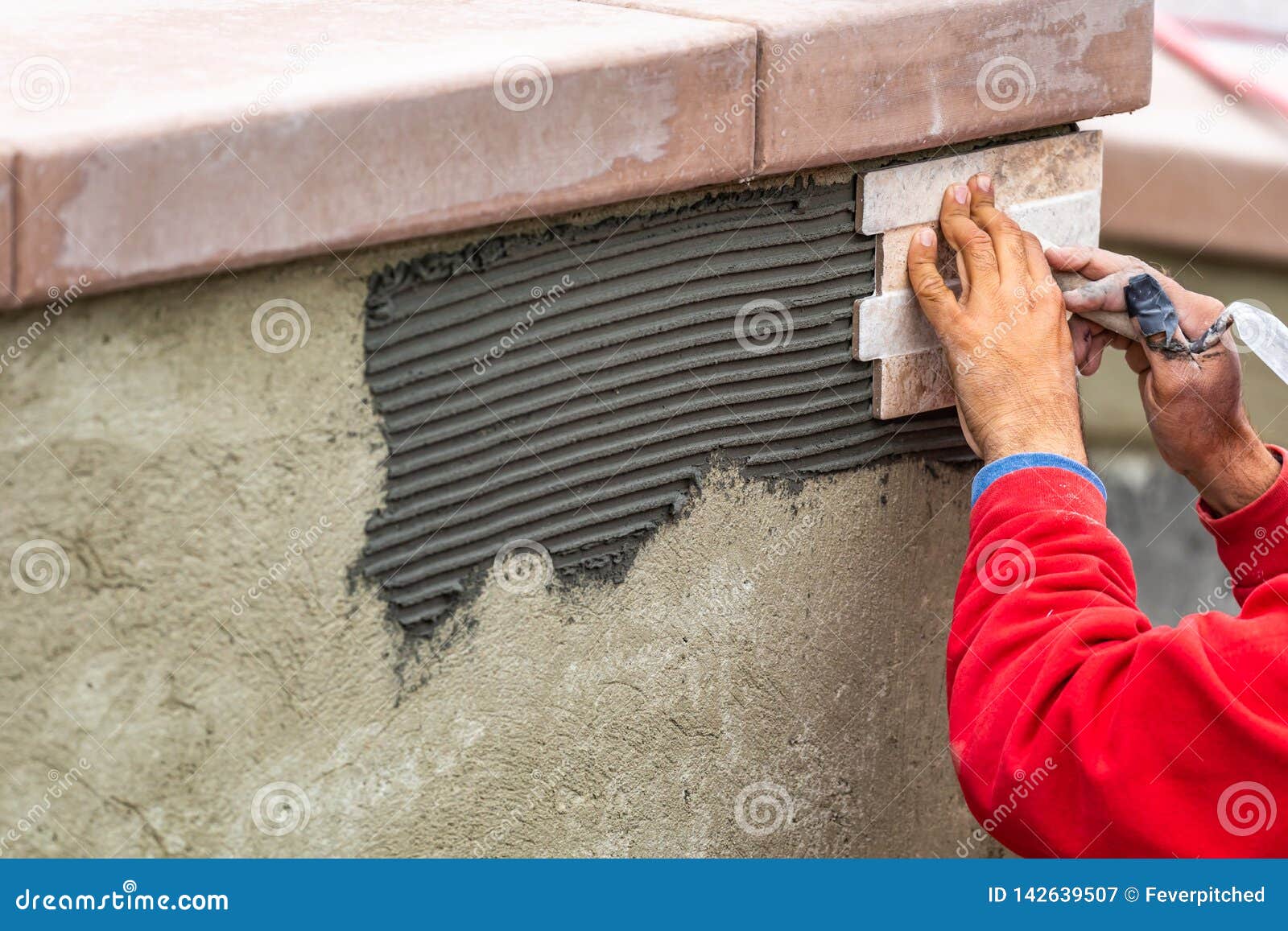 Worker Installing Wall Tile at Construction Site Stock Image Image of