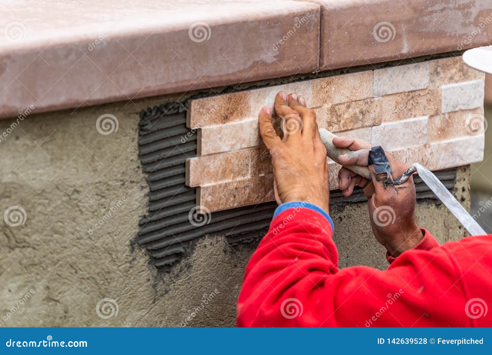 Worker Installing Wall Tile at Construction Site Stock Photo Image of