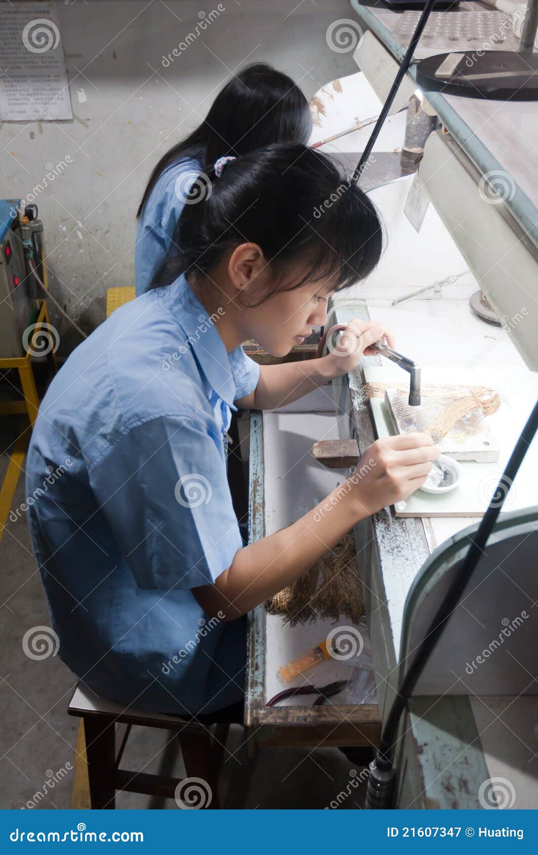 A worker of jewelry editorial photography. Image of chinese 21607347