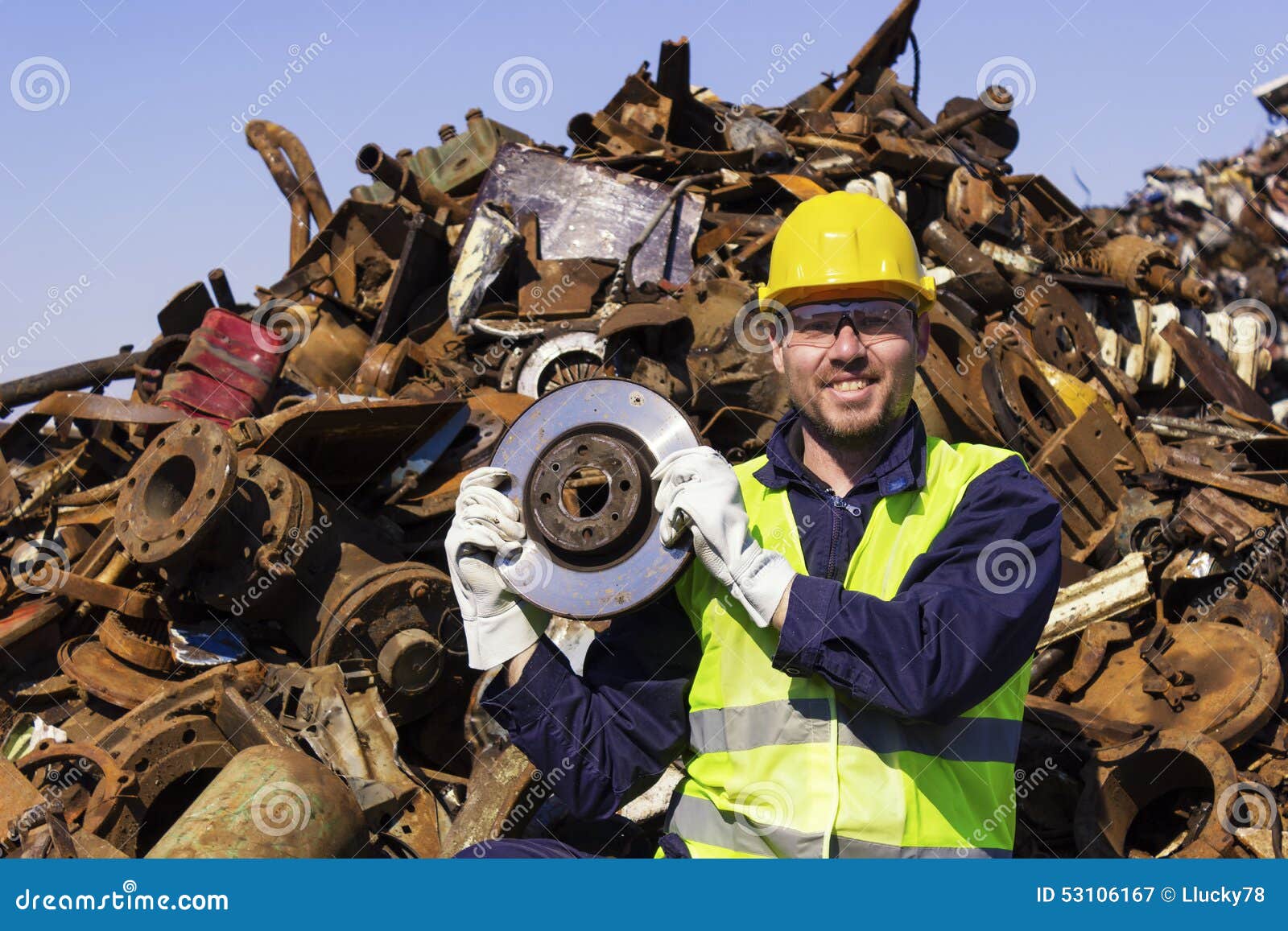 Worker on Junkyard Hold Rotor Like Shiny Trophy Stock Image Image of