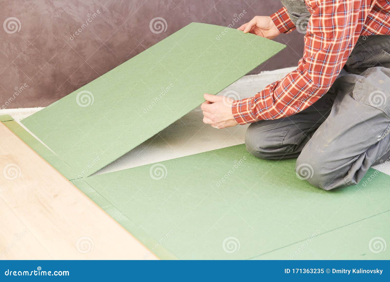 Worker Laying Laminate Floor Underlayer Padding Stock Image Image of