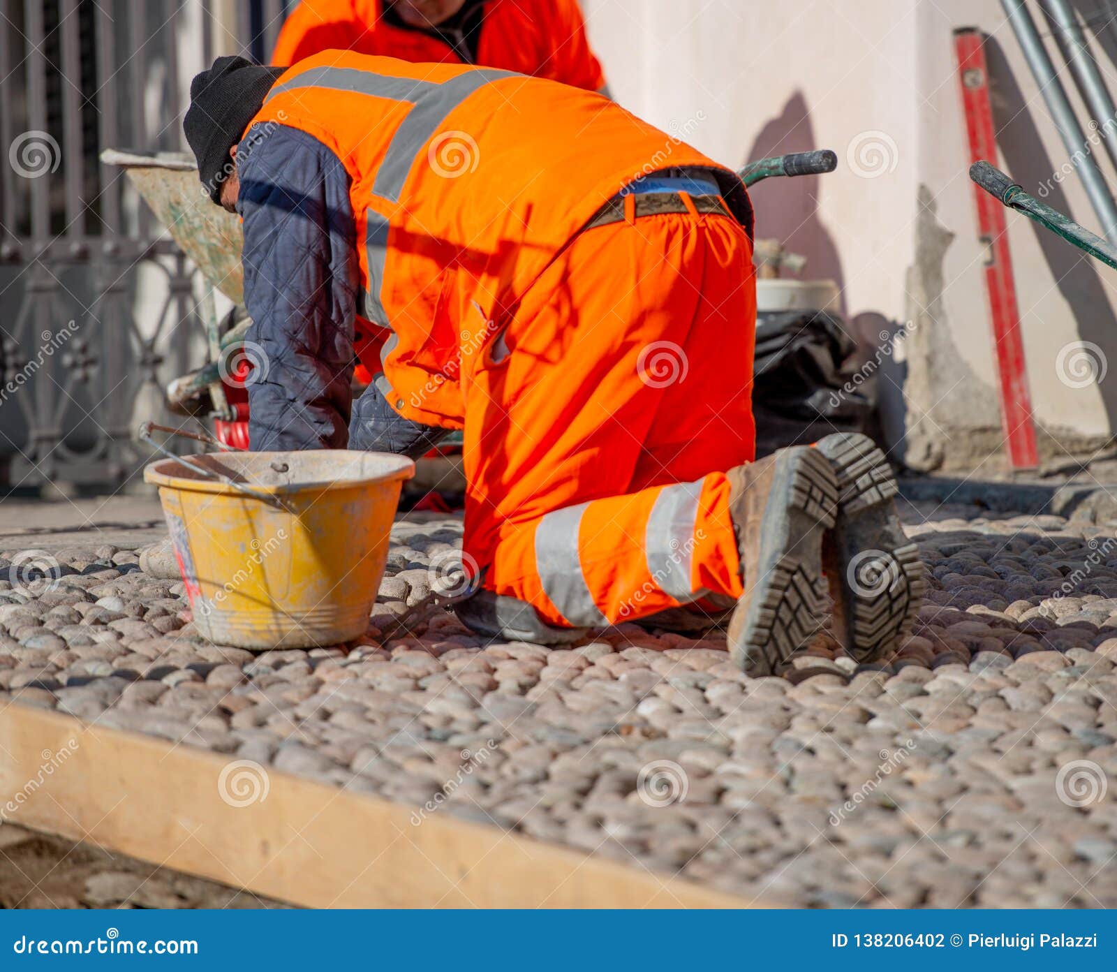 Laying of Cobblestone Flooring Stock Photo Image of masonry, flooring