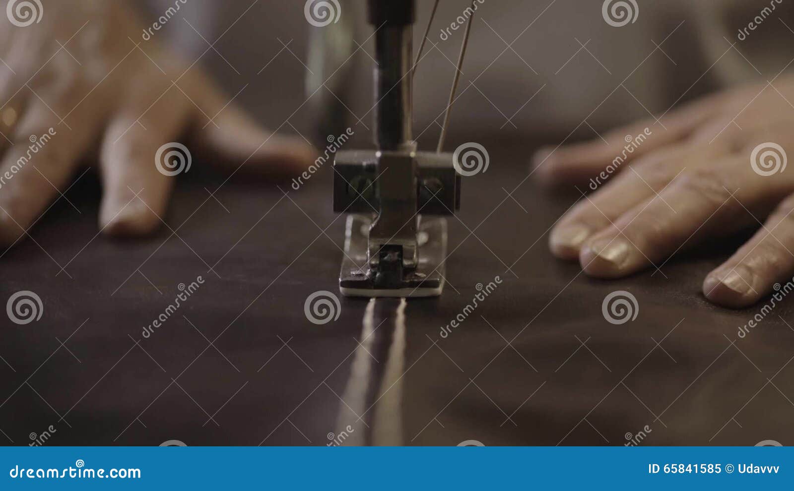 Worker Makes Seams on Leather Material by Sewing Machine in Factory