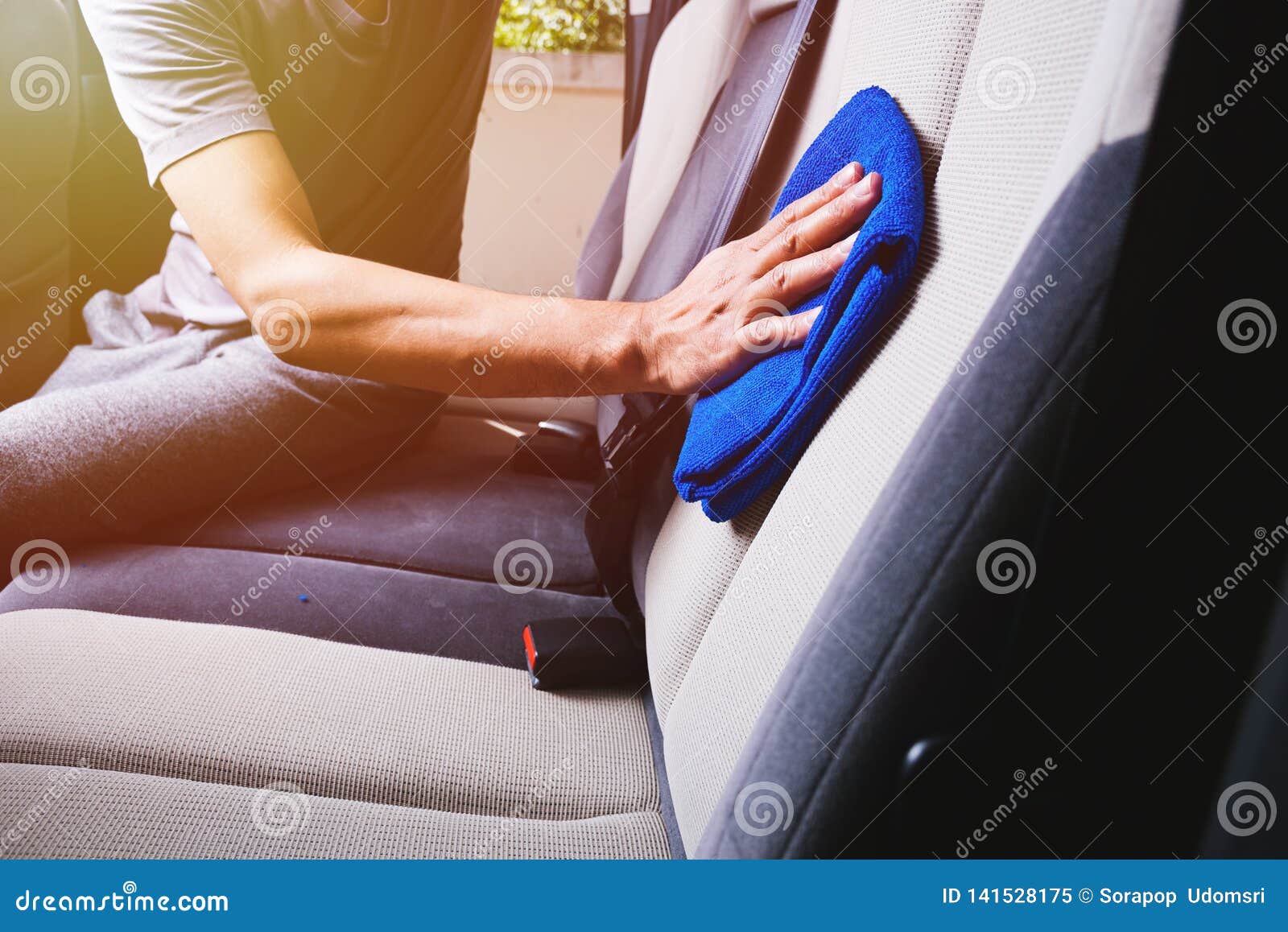 Worker Man Cleaning Dust Interior by Cloth Microfiber Inside Car Stock