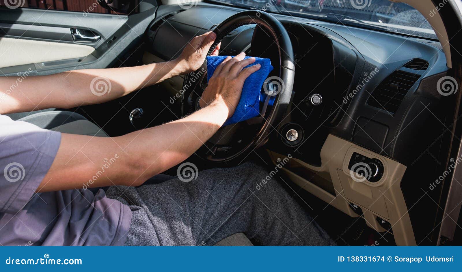 Worker Man Cleaning Dust Interior by Cloth Microfiber Inside Car Stock