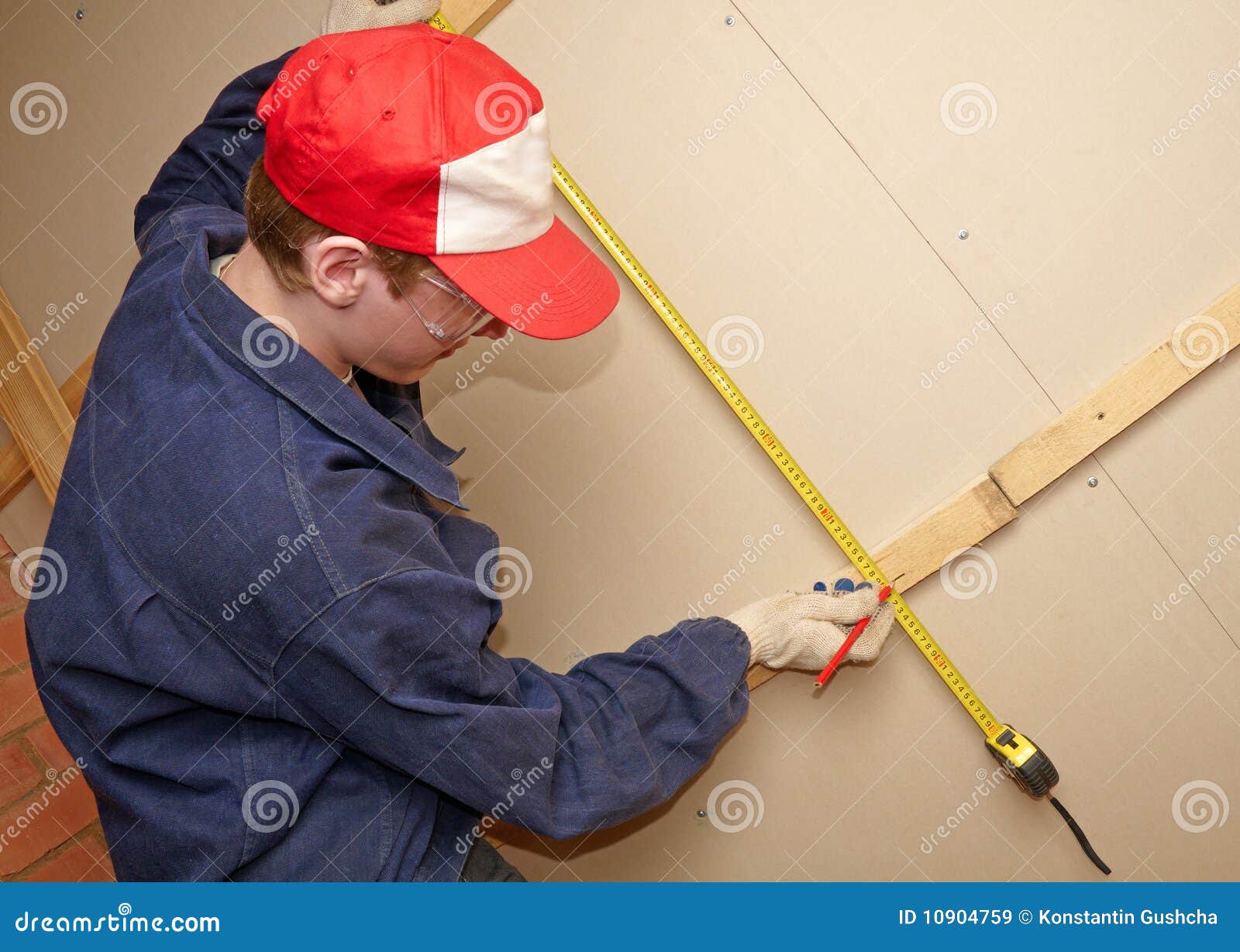 The worker measures stock image. Image of engineering 10904759