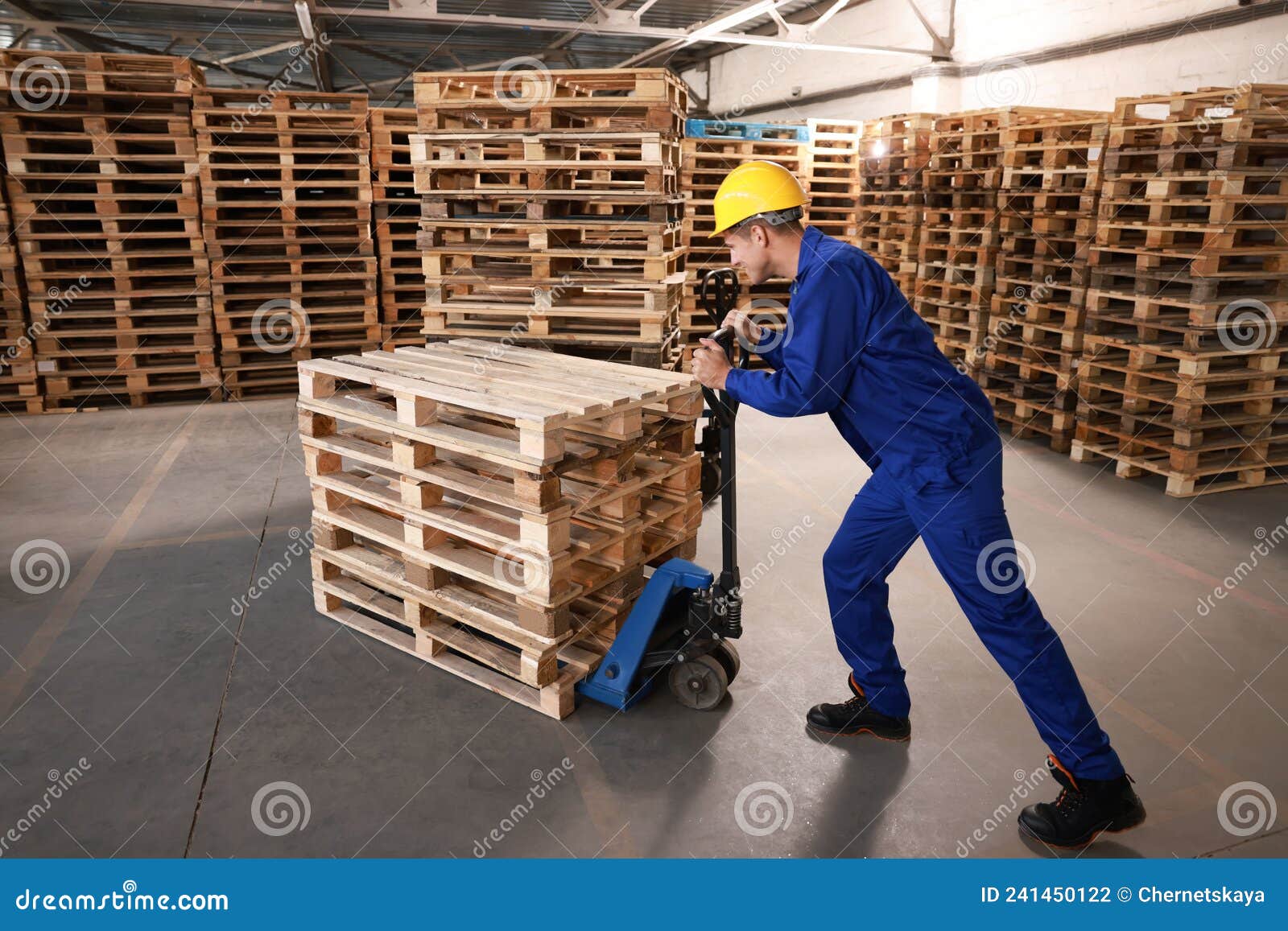 Worker Moving Wooden Pallets with Manual Forklift in Warehouse Stock Photo Image of manual