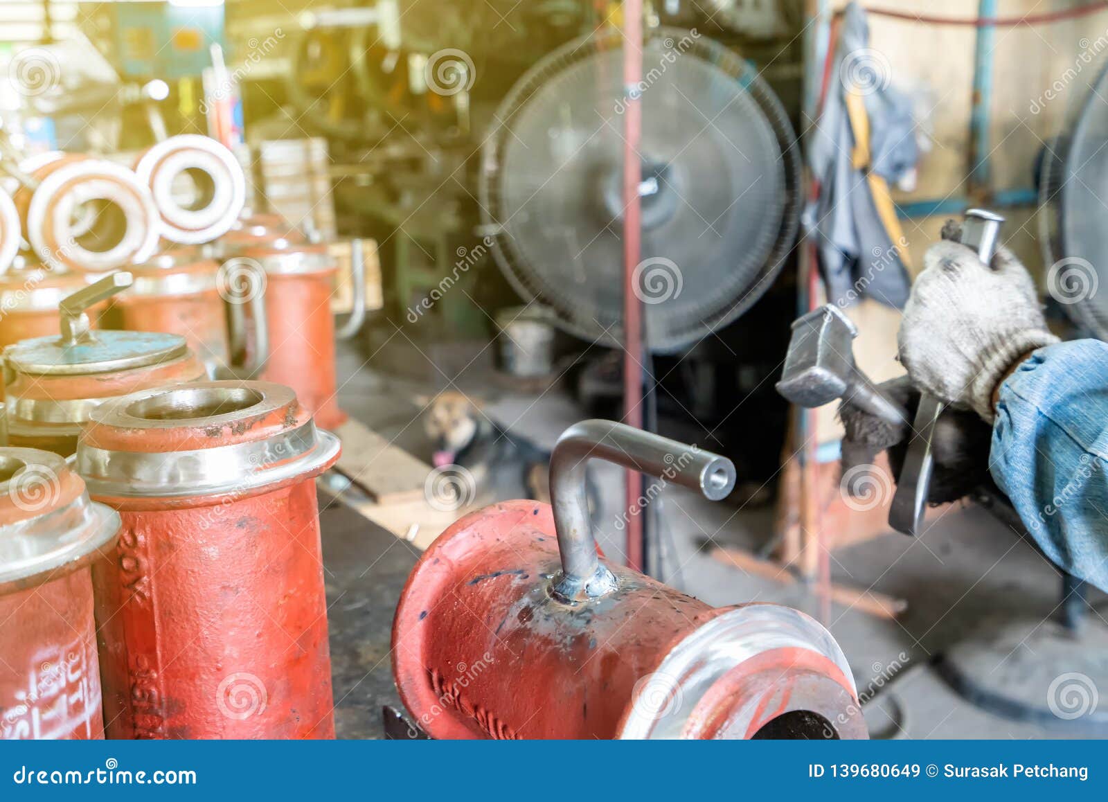 Worker or Operator Cleaning Welding Seam Remove by Knock with Hammer