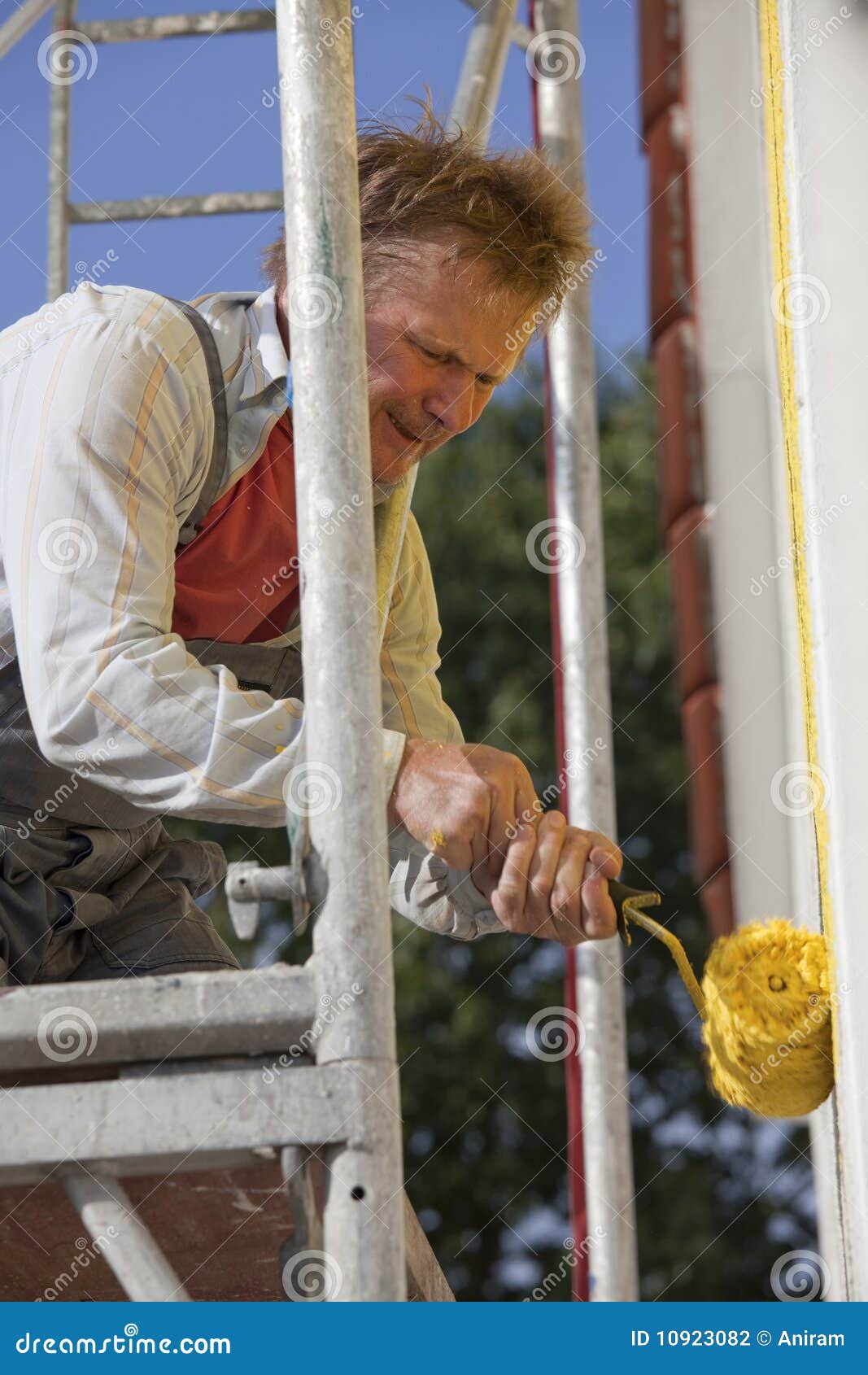Worker Painting House with Roller Stock Photo Image of worker