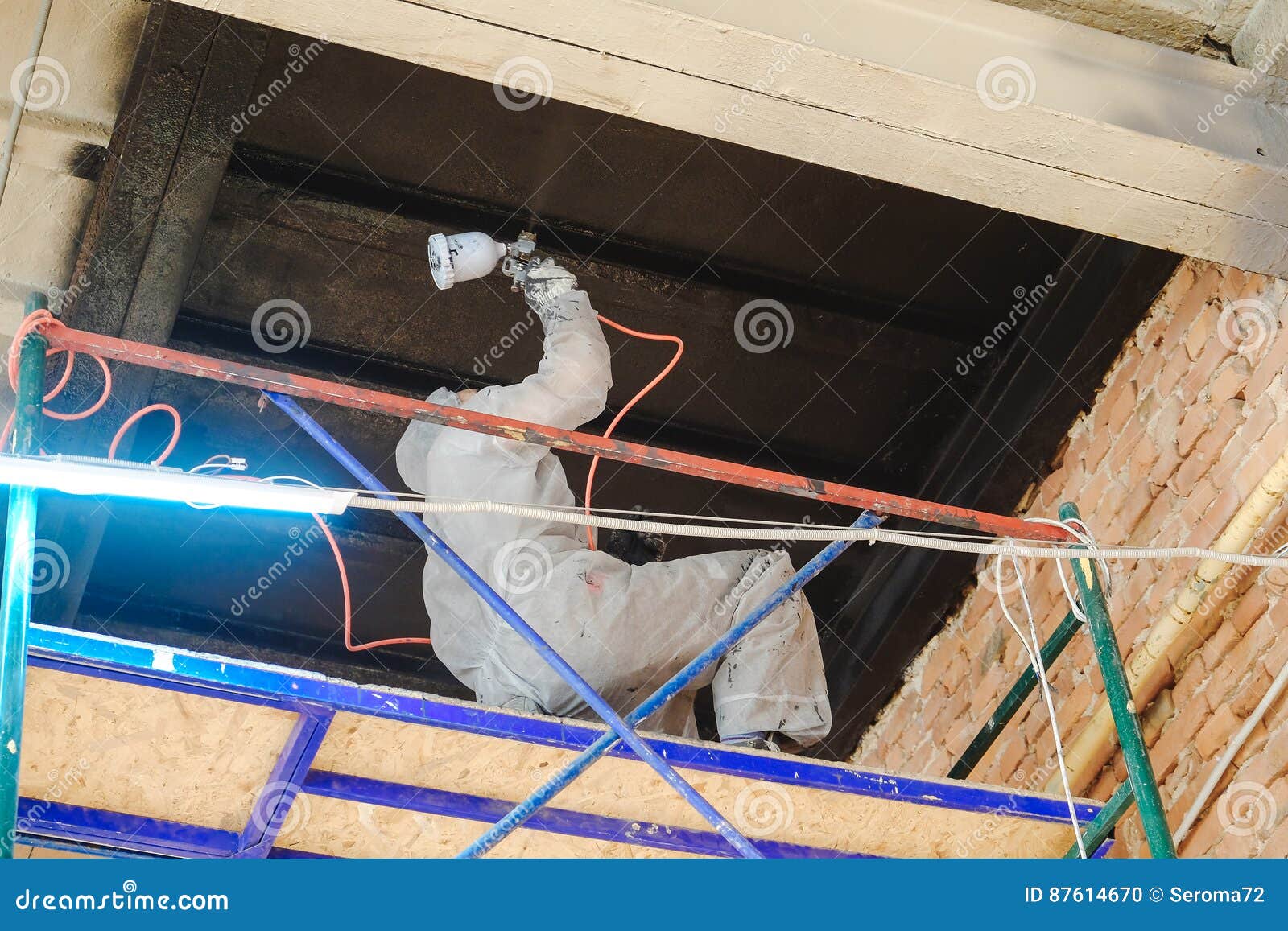 Worker Paints By Spray Gun Stock Photo Image Of Masking 87614670
