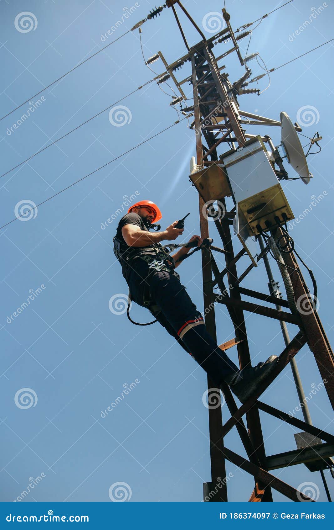 Worker in Red Helmet Working on 5G Antenna System Stock Image Image