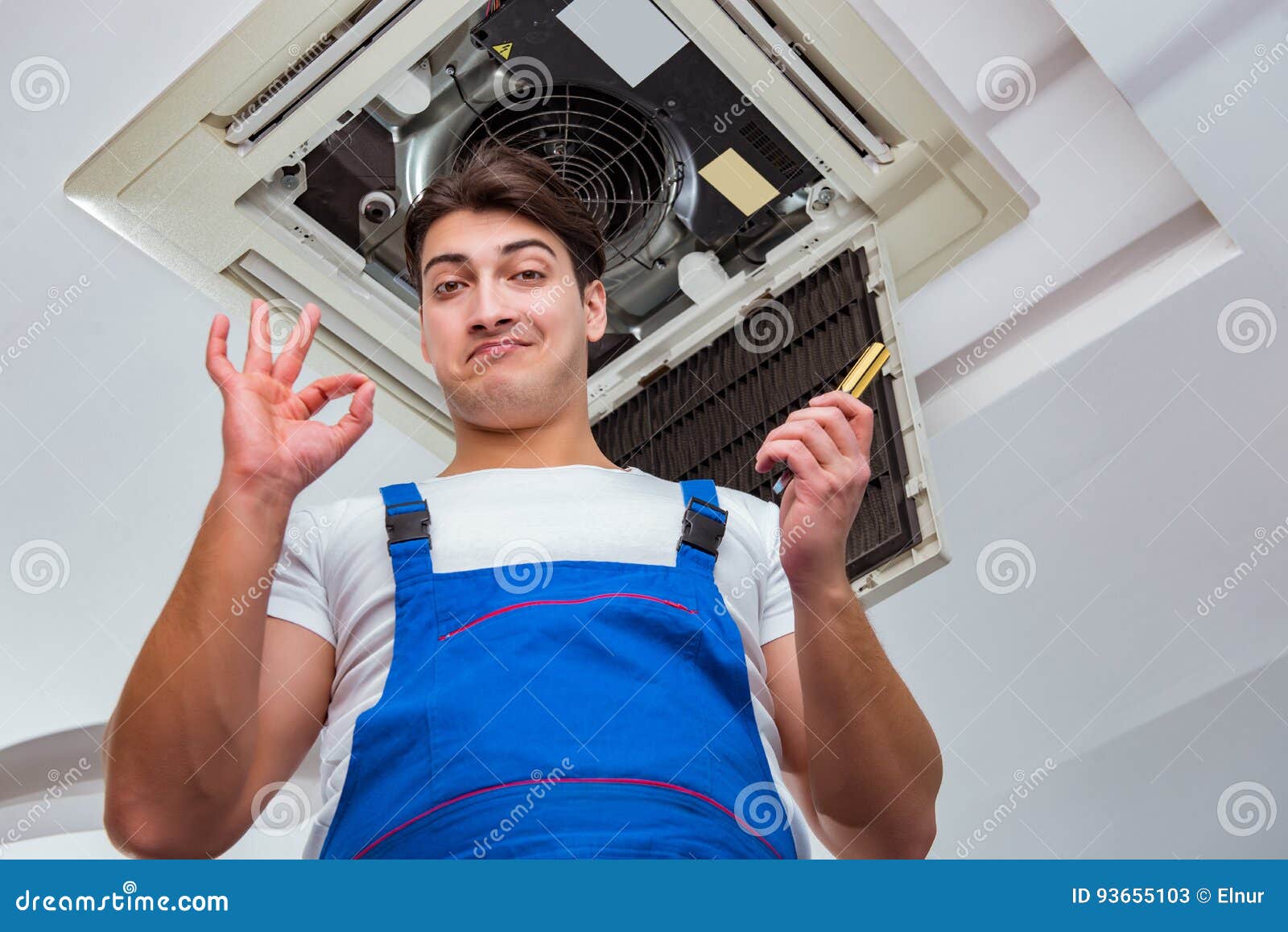 The Worker Repairing Ceiling Air Conditioning Unit Stock Image Image