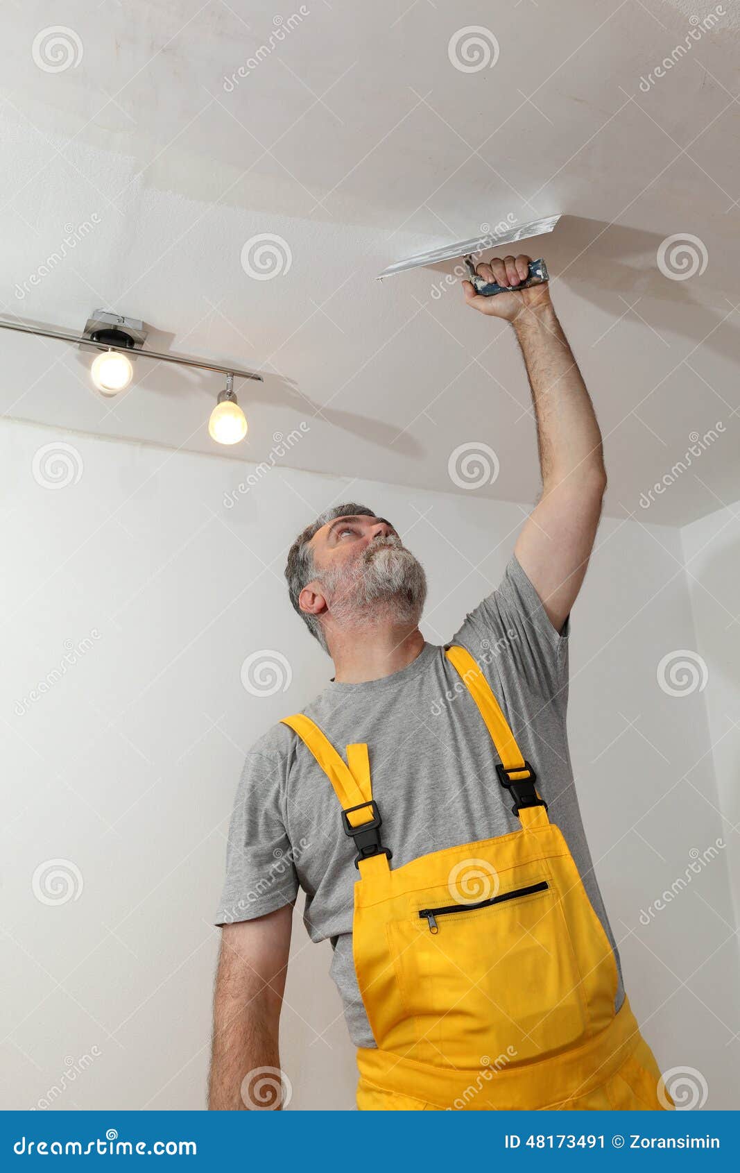 Worker Repairing Plaster At Ceiling Stock Image Image Of