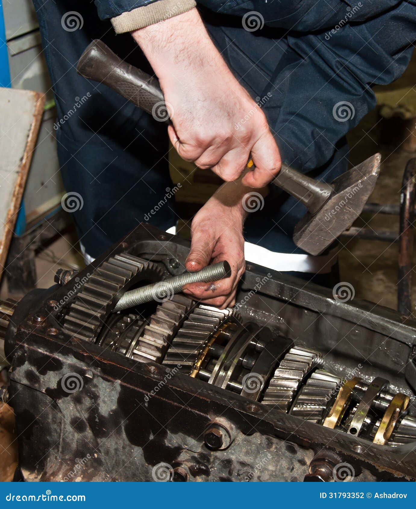 Worker Repairs Transmission Stock Photo Image of profession