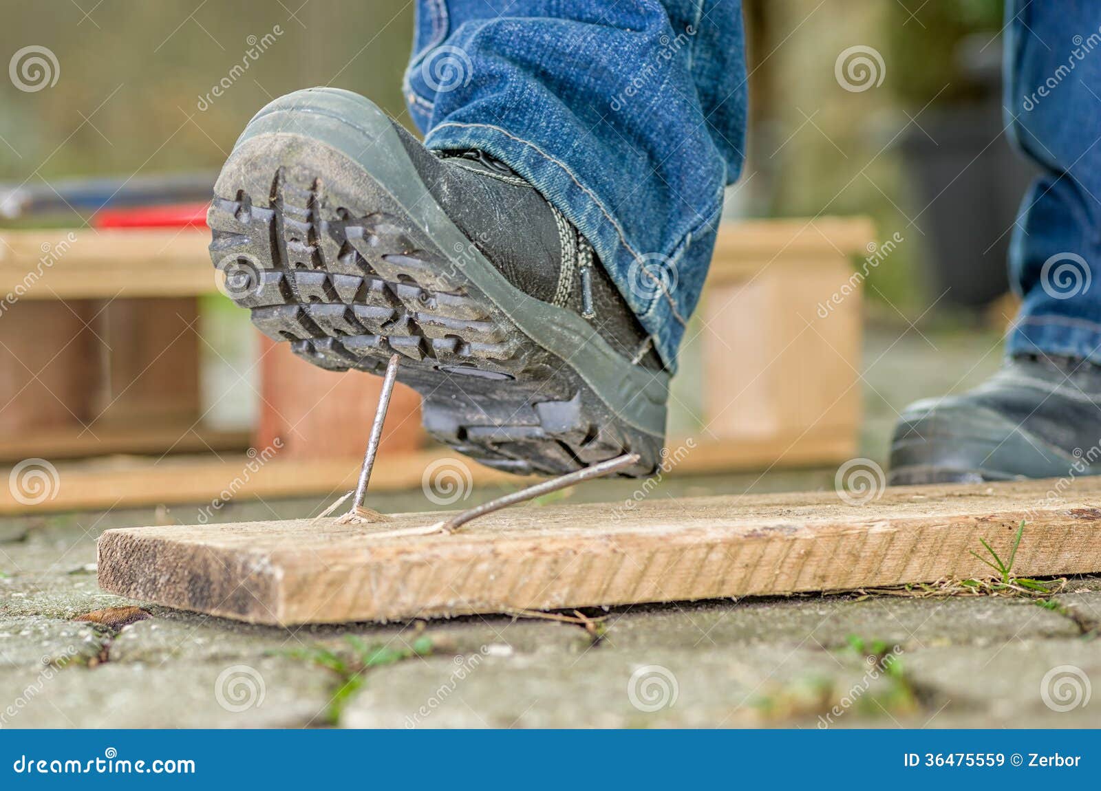 A Worker With Safety Boots Steps On A Rusty Nail Stock Image Image of