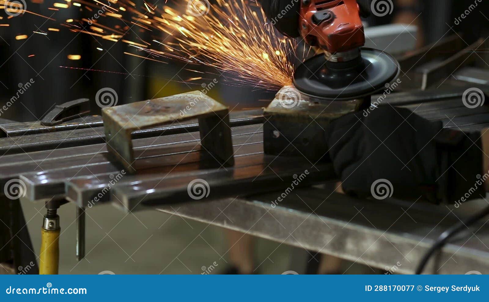 Worker Sanding Welding Seam Iron Steel Pipe Profile, Using Angle