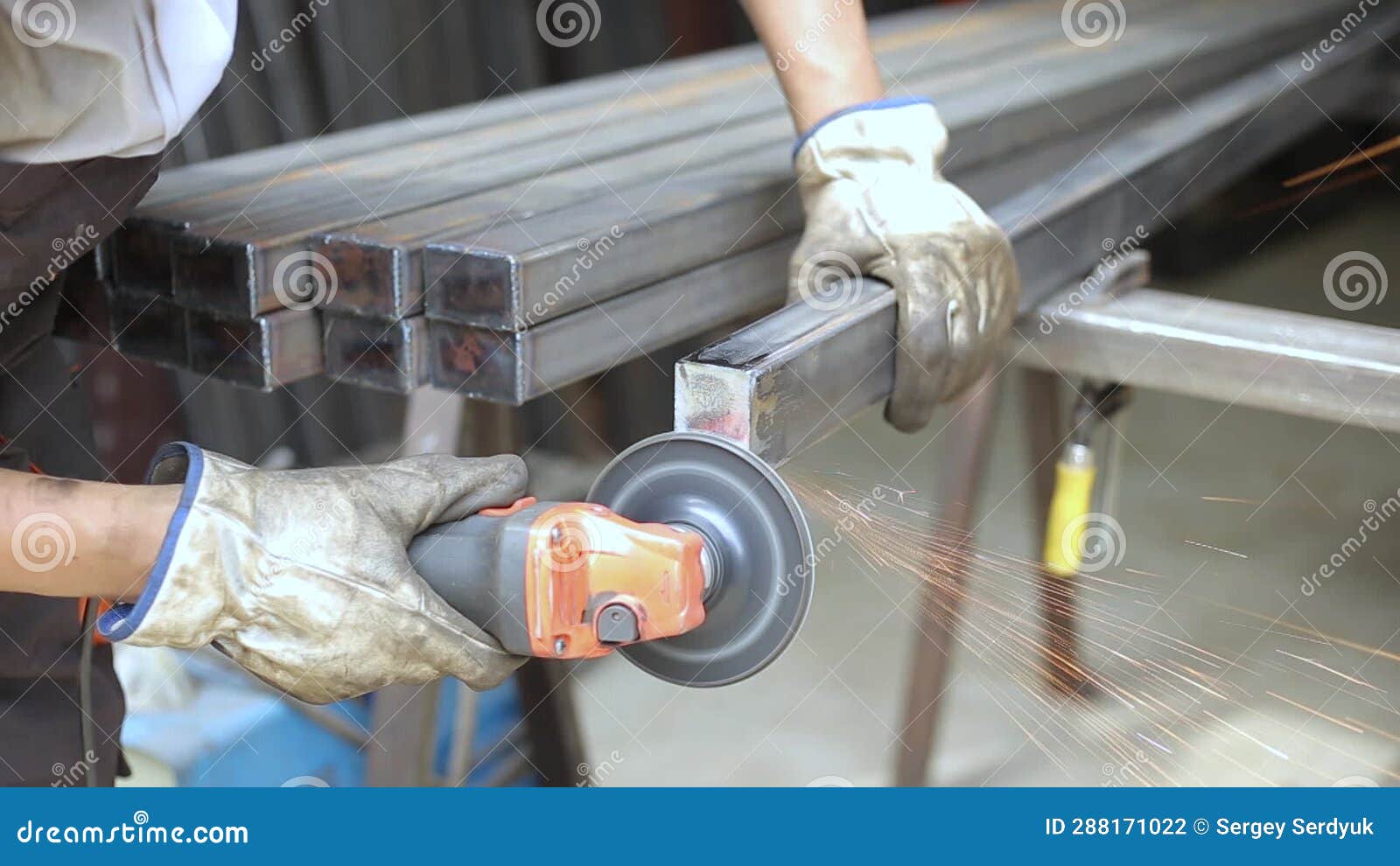 Worker Sanding Welding Seam Iron Steel Pipe Profile, Using Angle