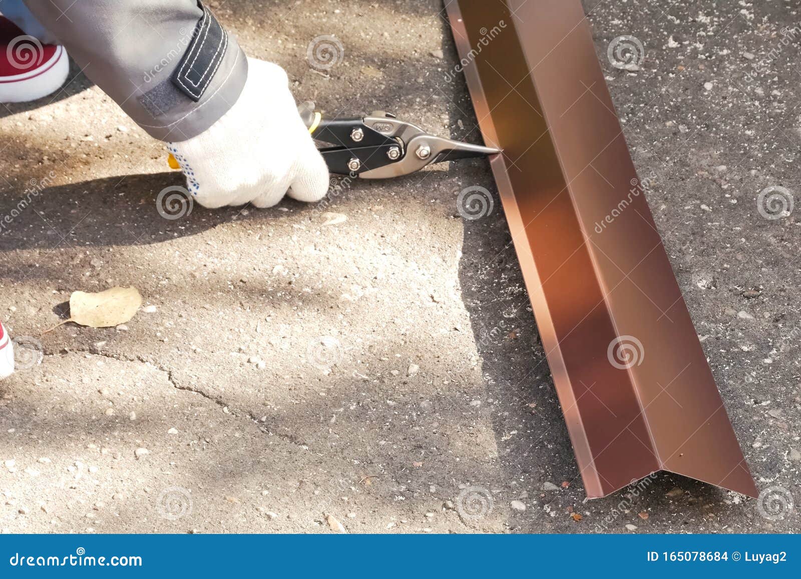 Worker Shears Sheet of Roofing Metal. Scissors for Metal Stock Photo Image of metal, hand
