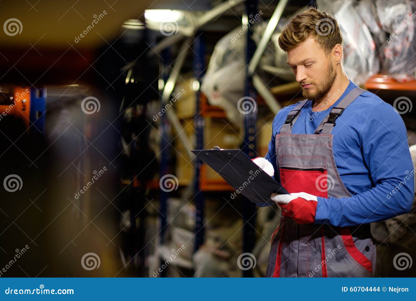 Worker in a Spare Parts Warehouse Stock Photo Image of looking